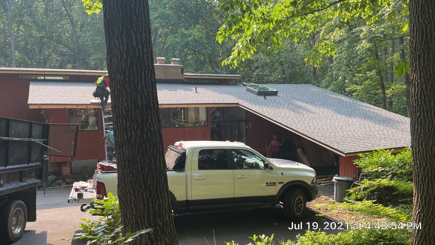 Deckhouse Roof Replacement by American Home Contractors