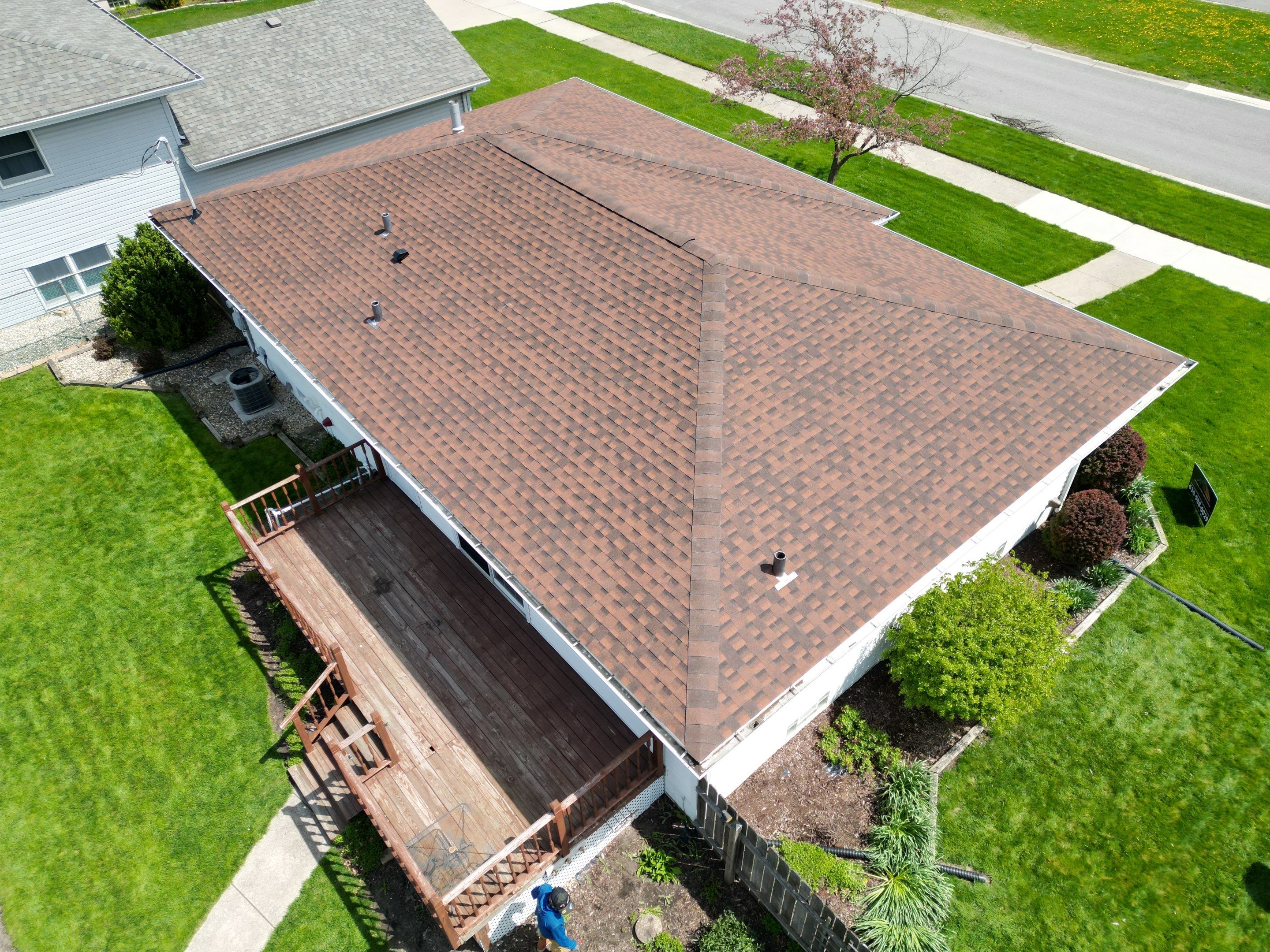 House and garage roof replacement by Optimal Home Improvement 