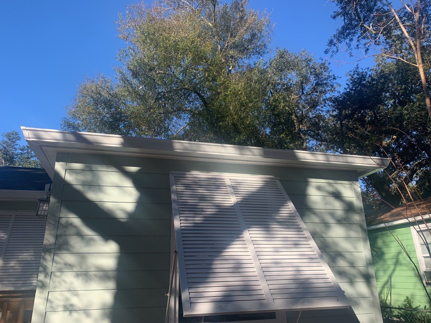 White Seamless Gutters for Panama City FL Homes by Gutter Professors