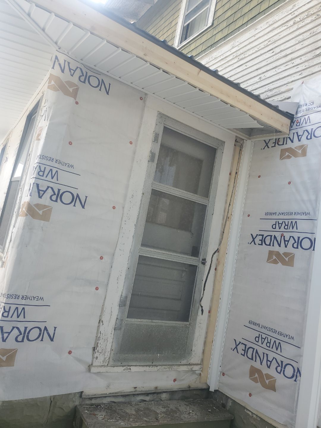 Roof Replacement using Metal by Rainstoppers Roofing