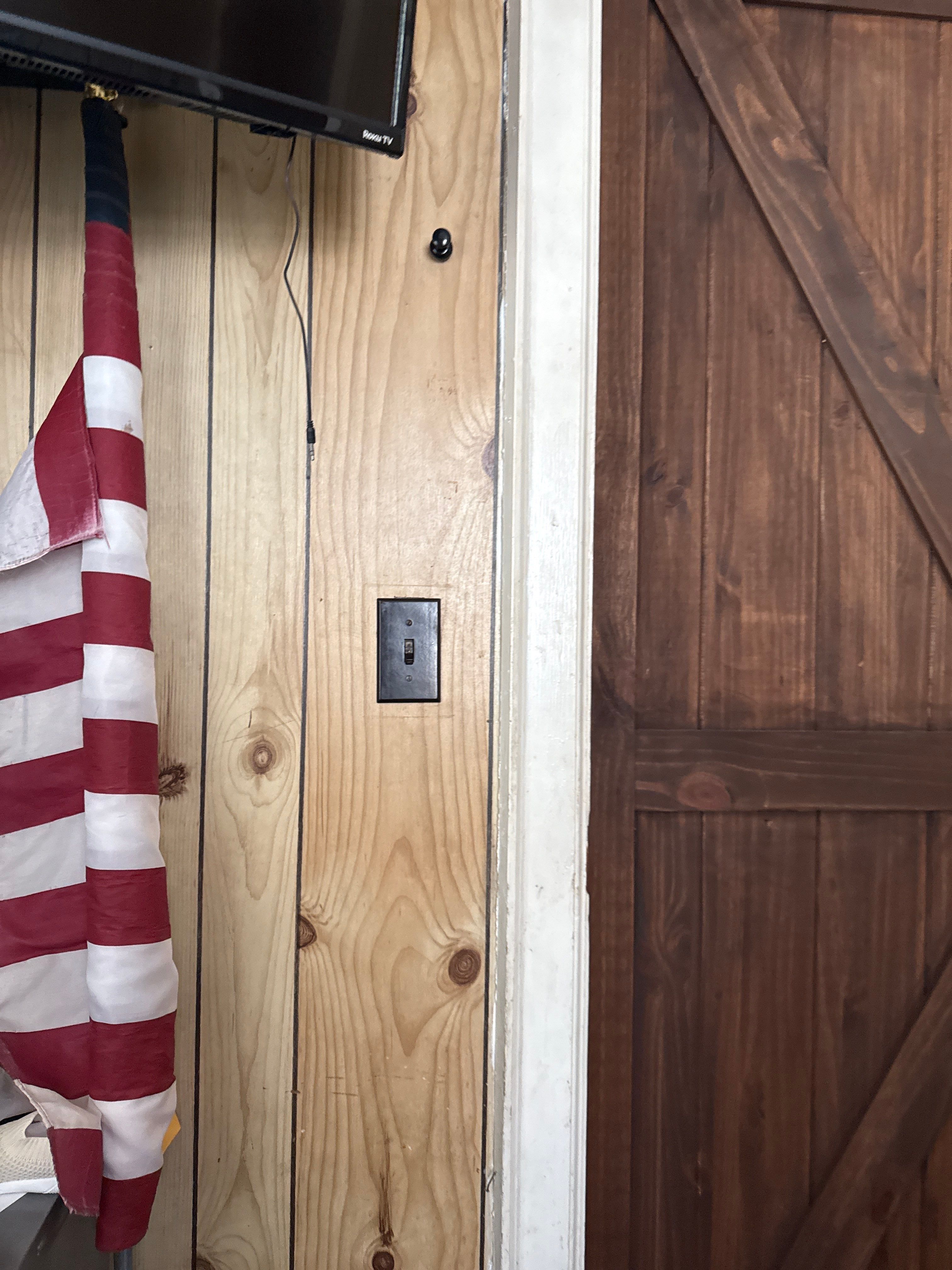 Commercial Office Remodel Featuring Knotty Pine Paneling and Hardwood Floors by CompanyCam Sales Demo