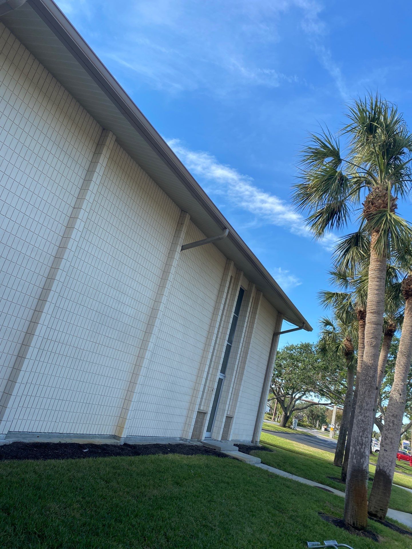 Grey Aluminum Gutters with Downspouts in Sarasota FL by Gutter Professors