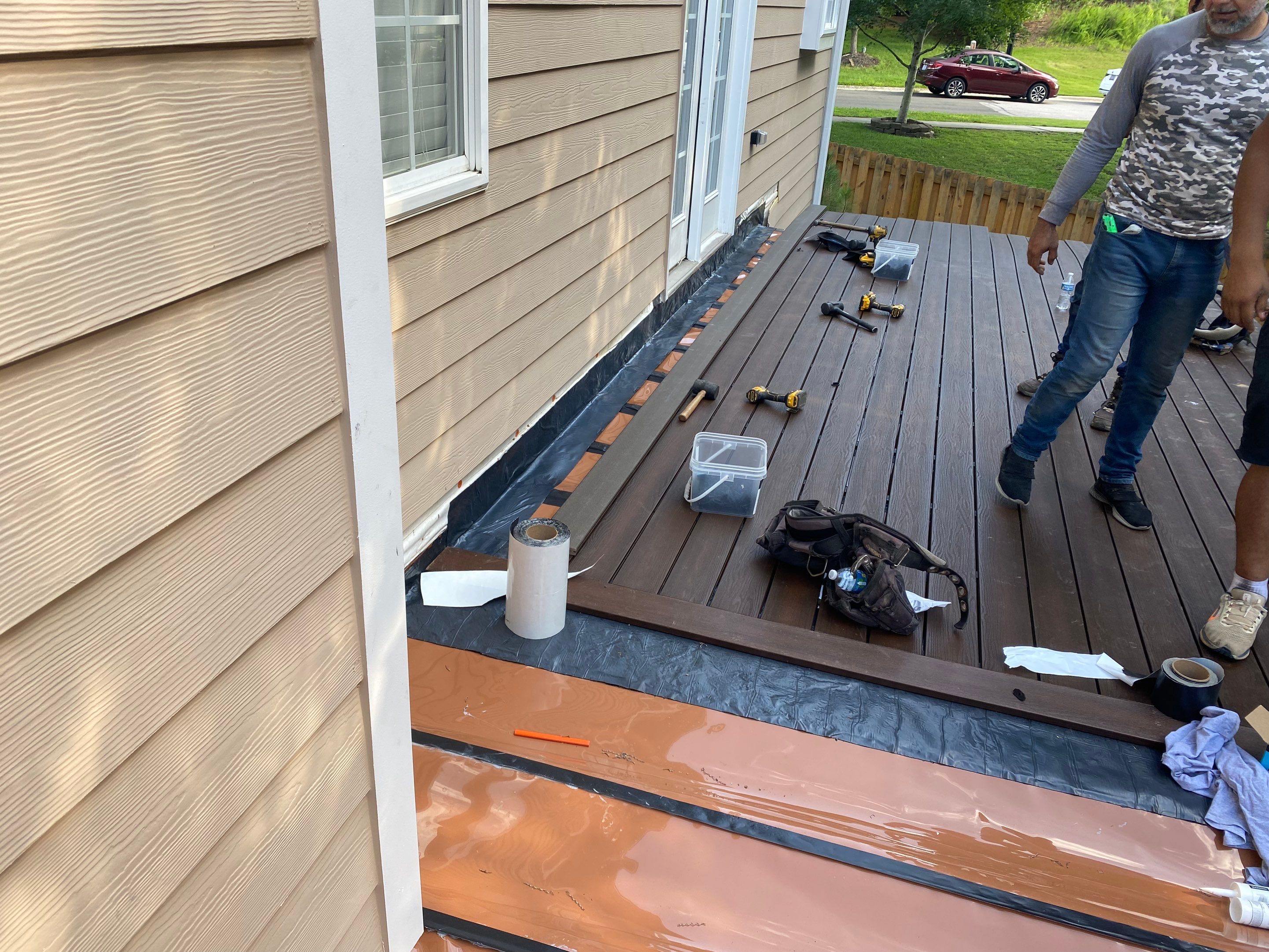 Trex Decking, Aluminum Railing, Rain Escape Underdecking by The Remodeling Company