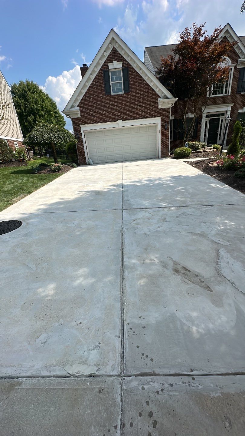 Pool Deck + Driveway + Garage Project in Venetia by Floors in a Day, Inc