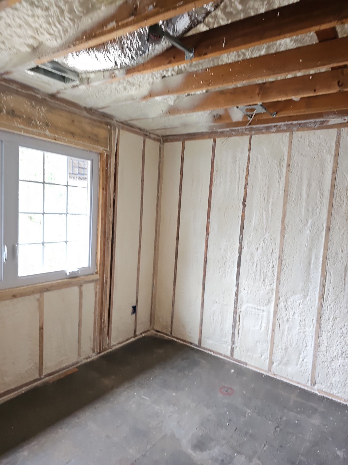 Basement Exterior Walls using Closed Cell Spray Foam by NYS Foam & Energy