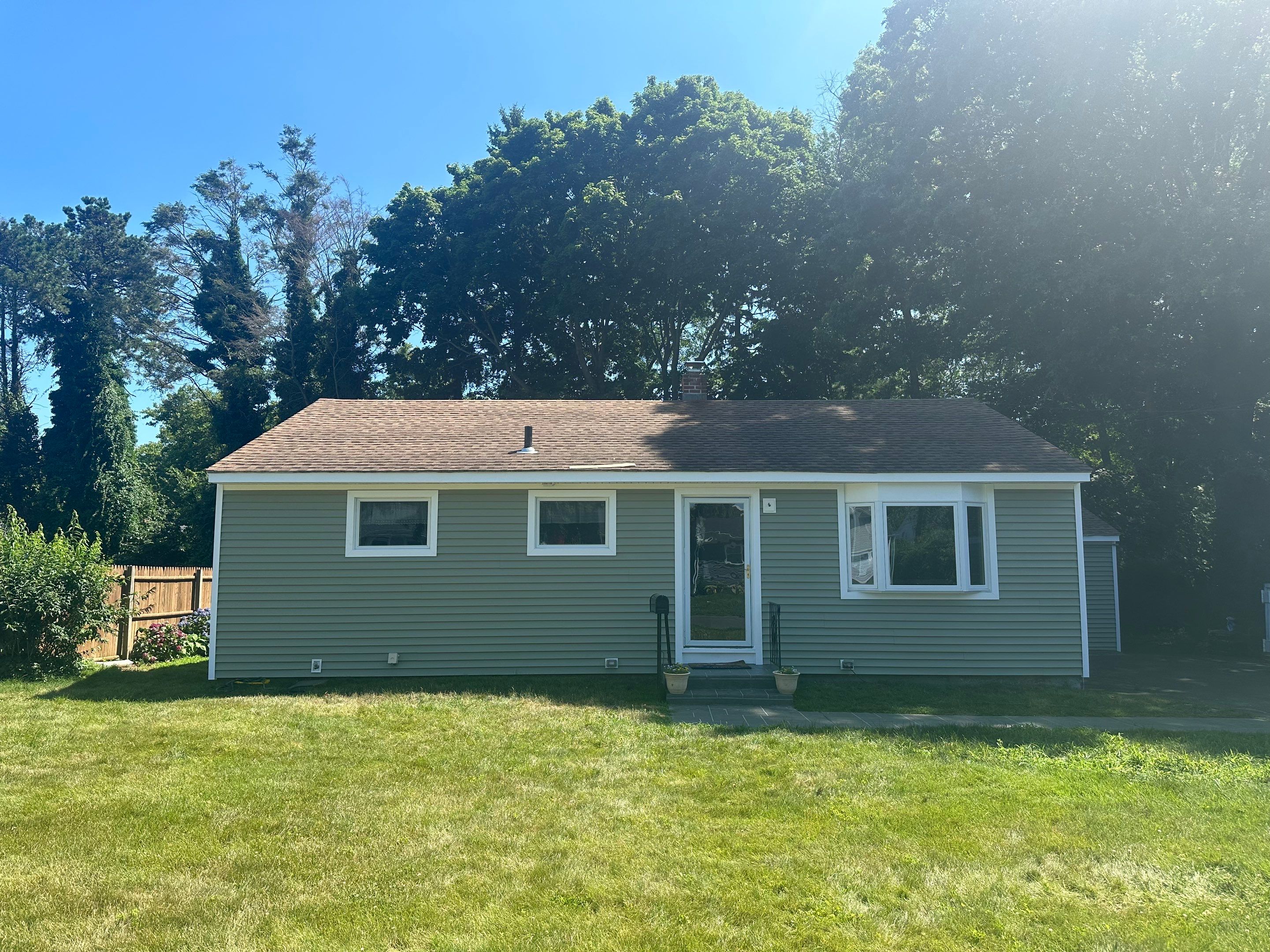 Siding Installation using Clapboard Monogram D4 Cypress by A Plus Exterior