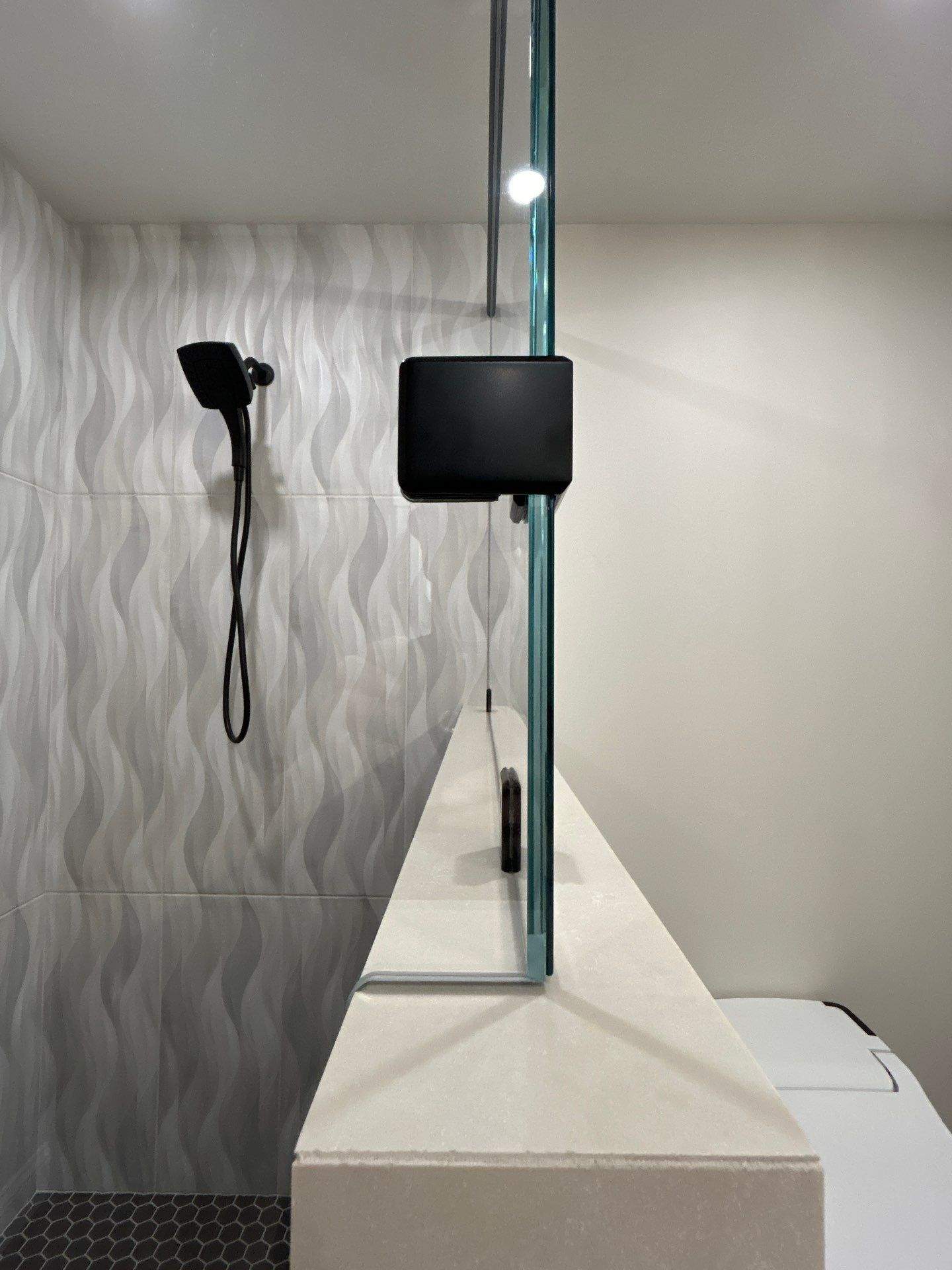 Frameless Shower Enclosure w/Header Bar by Cheshire Glass Company