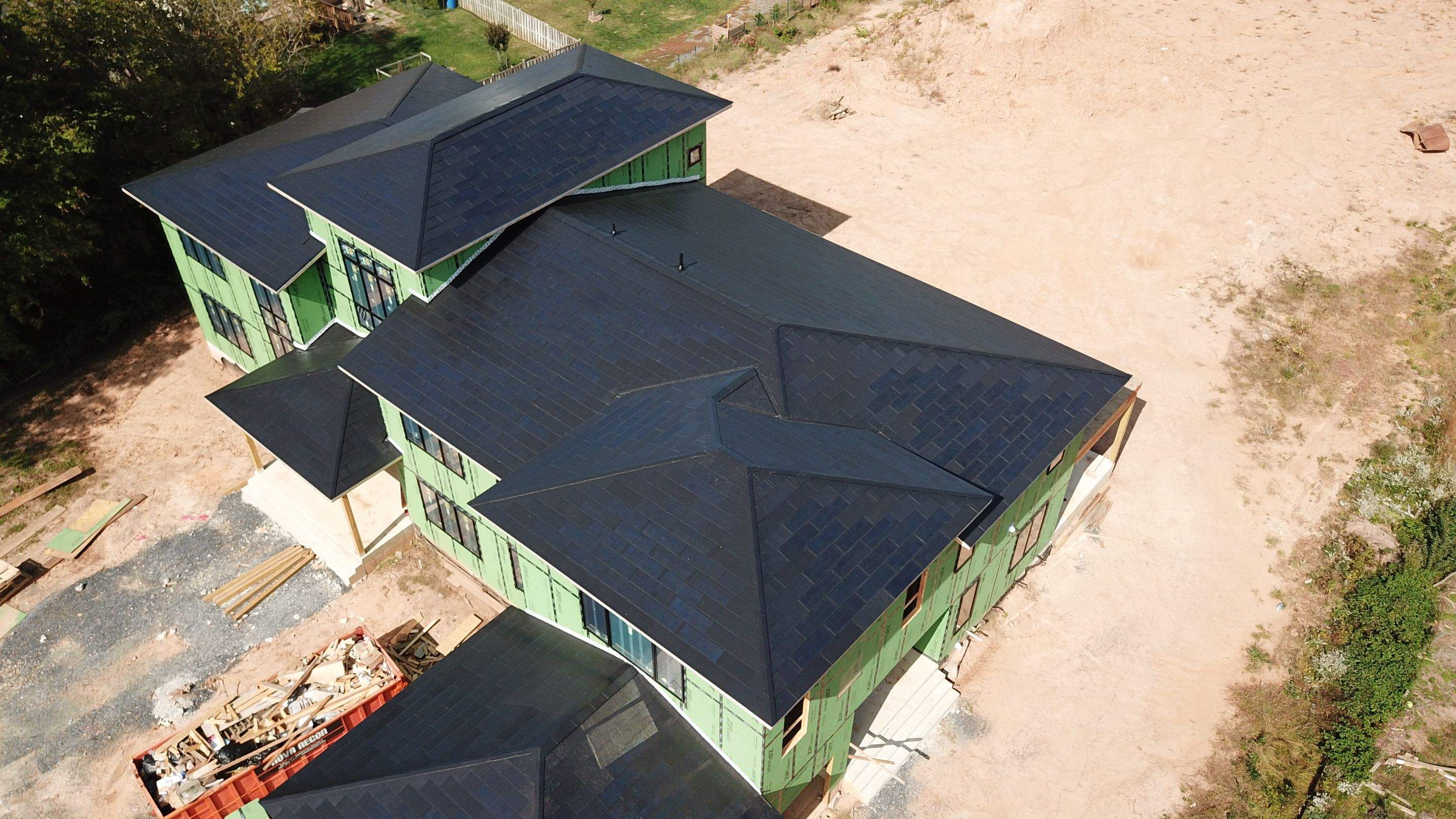 Tesla Solar Roof  using Tesla Solar Roof V3 tiles by American Home Contractors