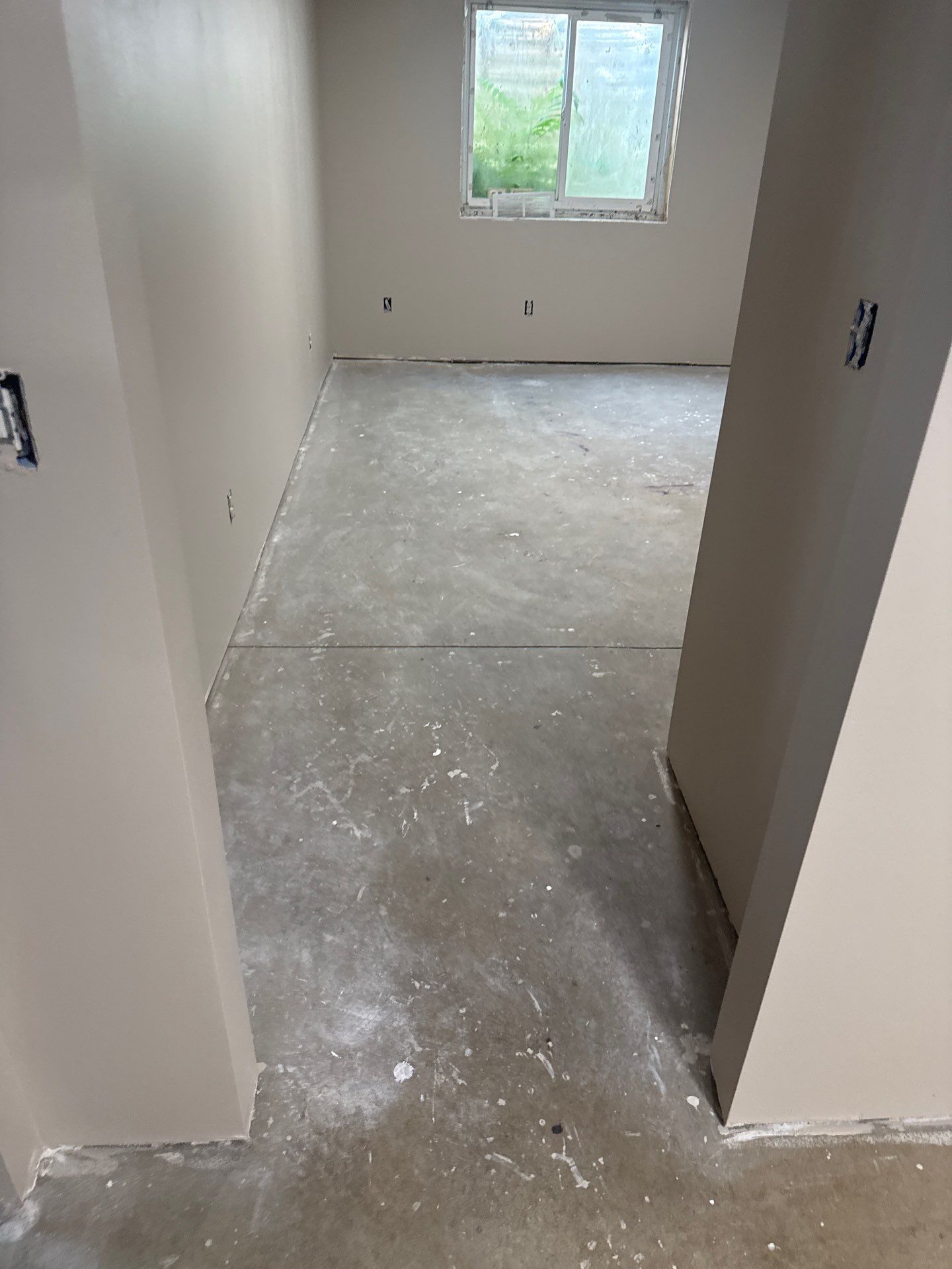 Basement Concrete Coating with Speckled Flake Finish in Elkhart by Revival Concrete Coatings