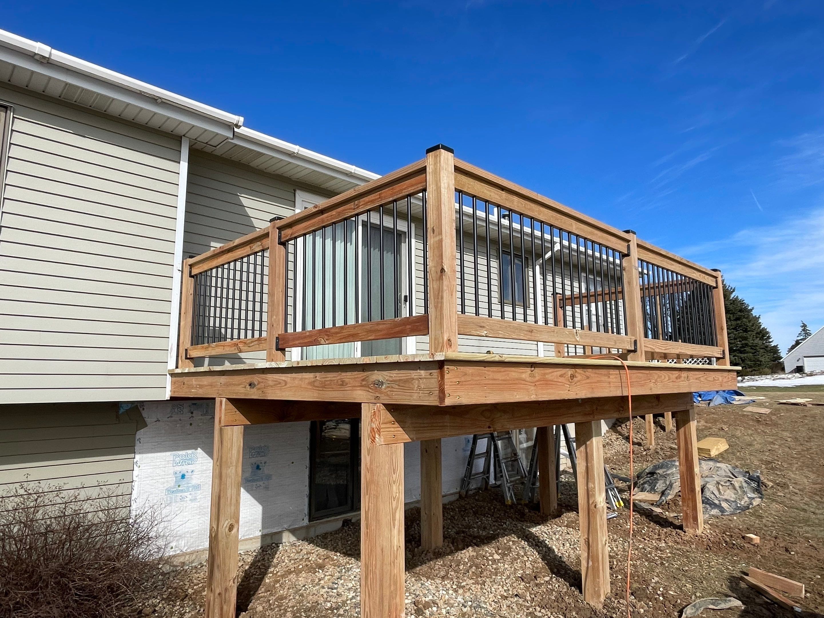 Deck Installation using Treated Lumber by Avalon Roofing and Exteriors