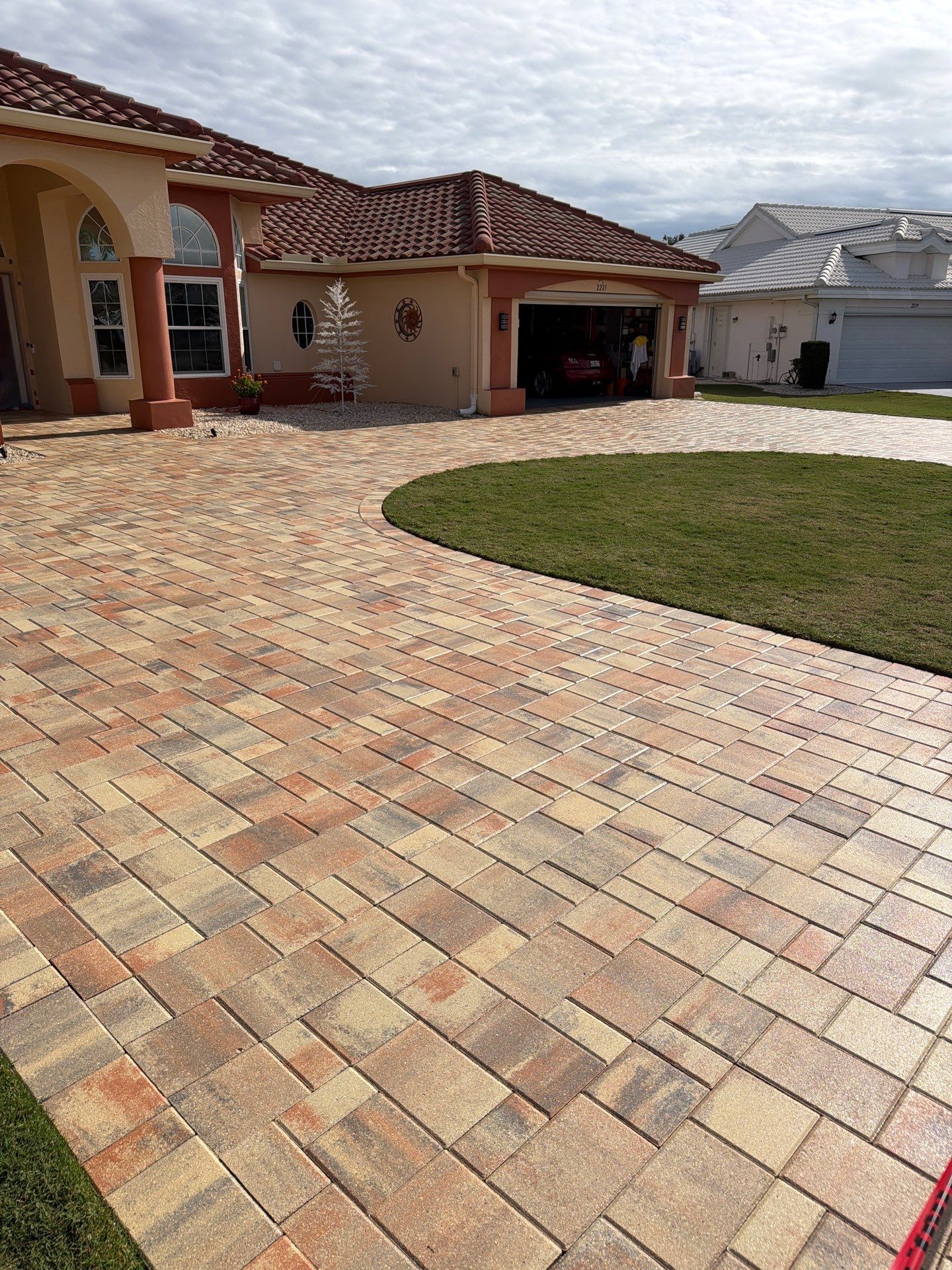 Professional Paver Sealing for this beautiful Driveway in Sun City Center by Supreme Paver Experts