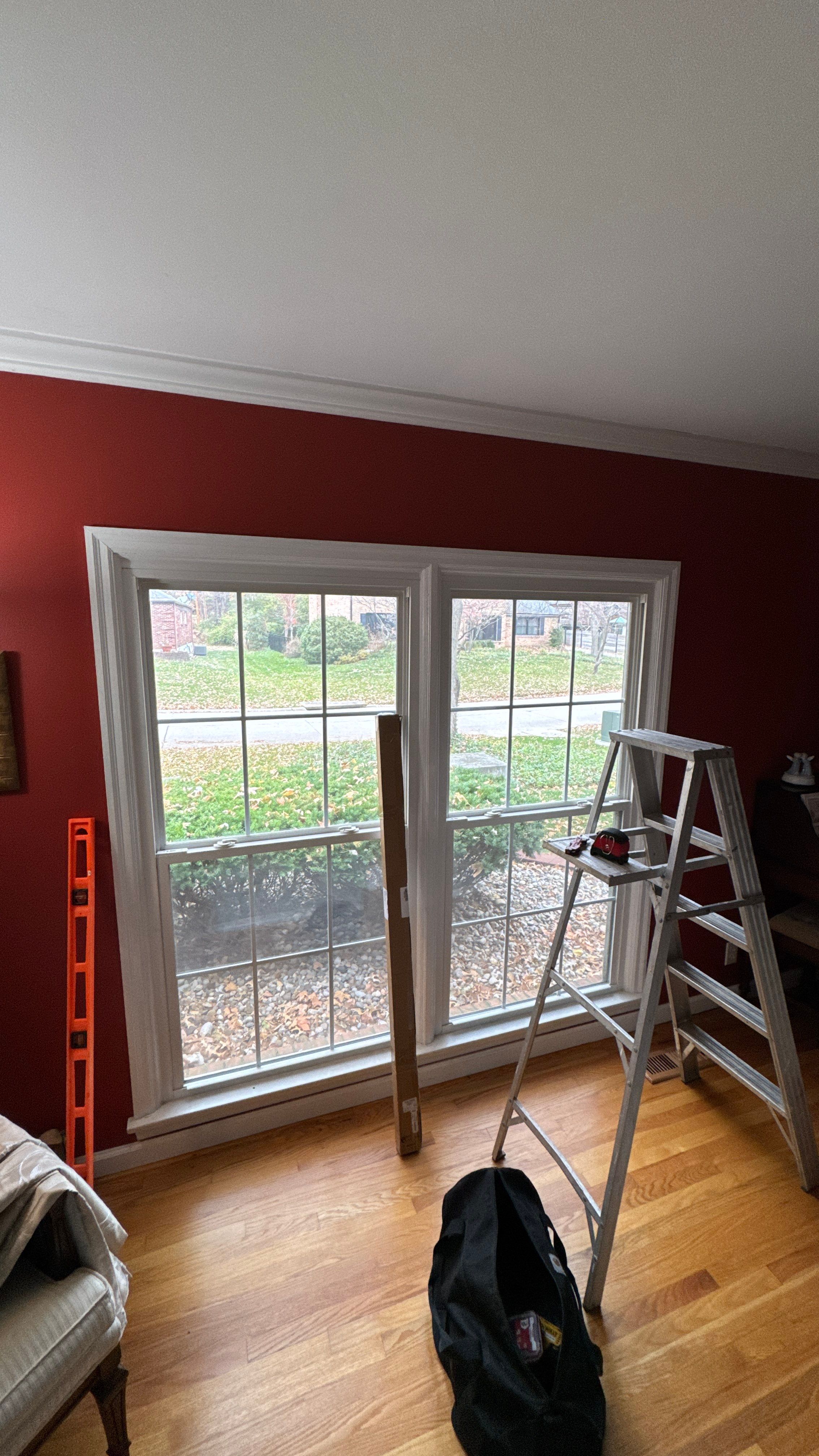 Handyman Project - Hanging Curtain Rods by Legendary Services Company LLC.