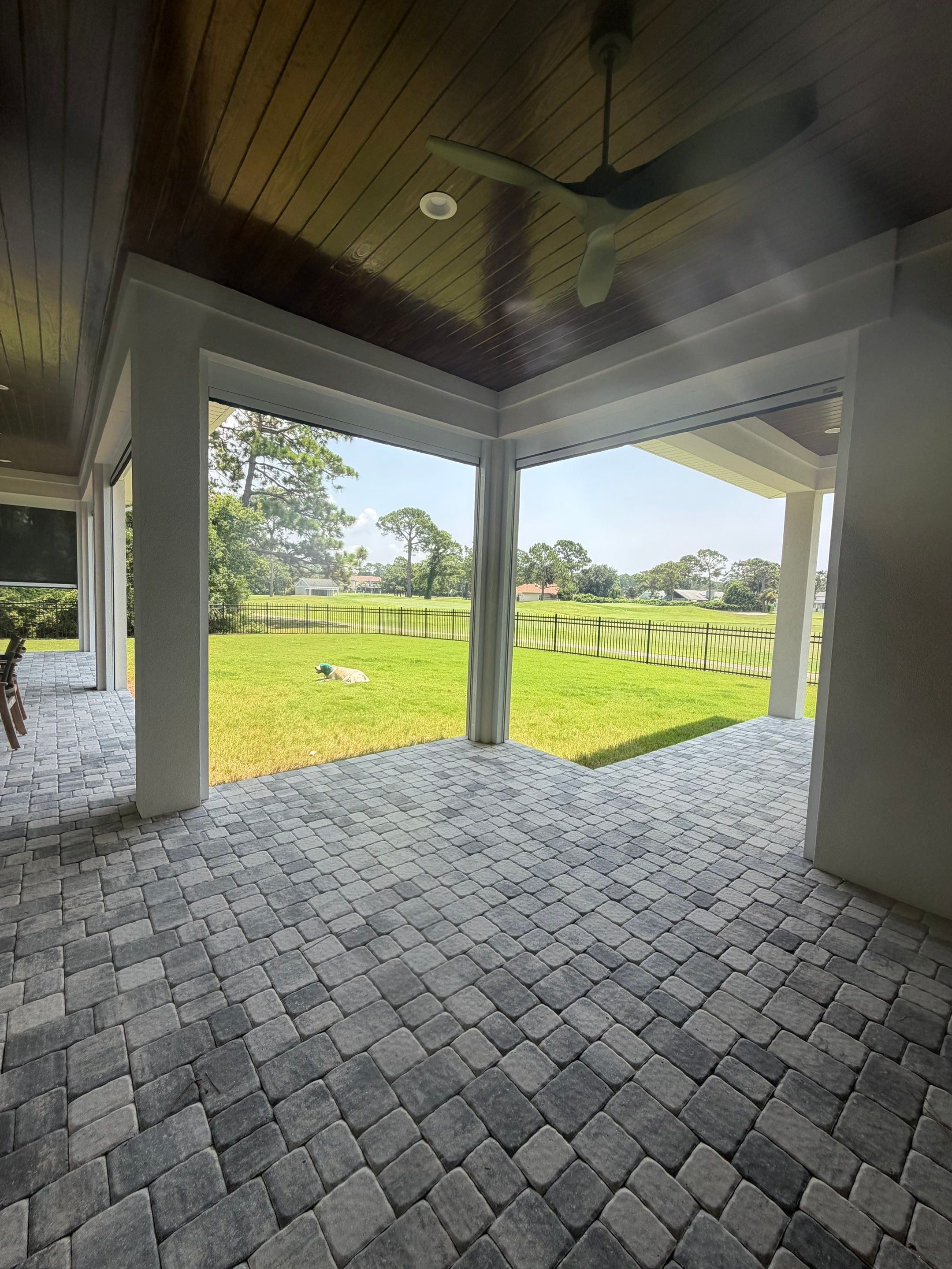 Motorized Screen and Solar Shade Installation in Panama City Beach by Brannan Aluminum Inc.