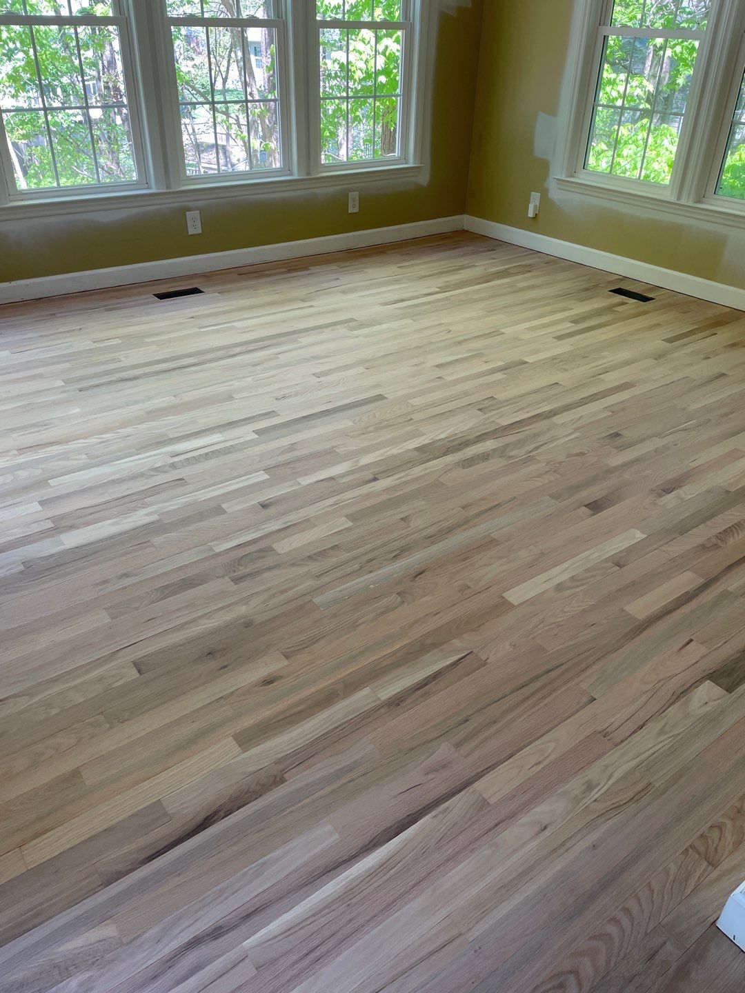 Red oak floor refinishing by Accent Custom Floors