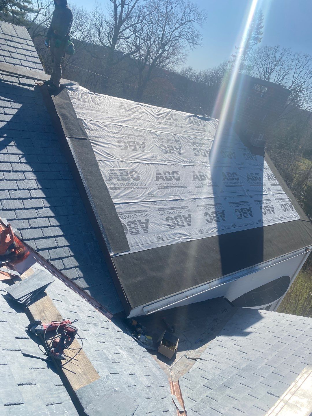 Residential Roofing Installation using Vermont Slate by A Plus Exterior