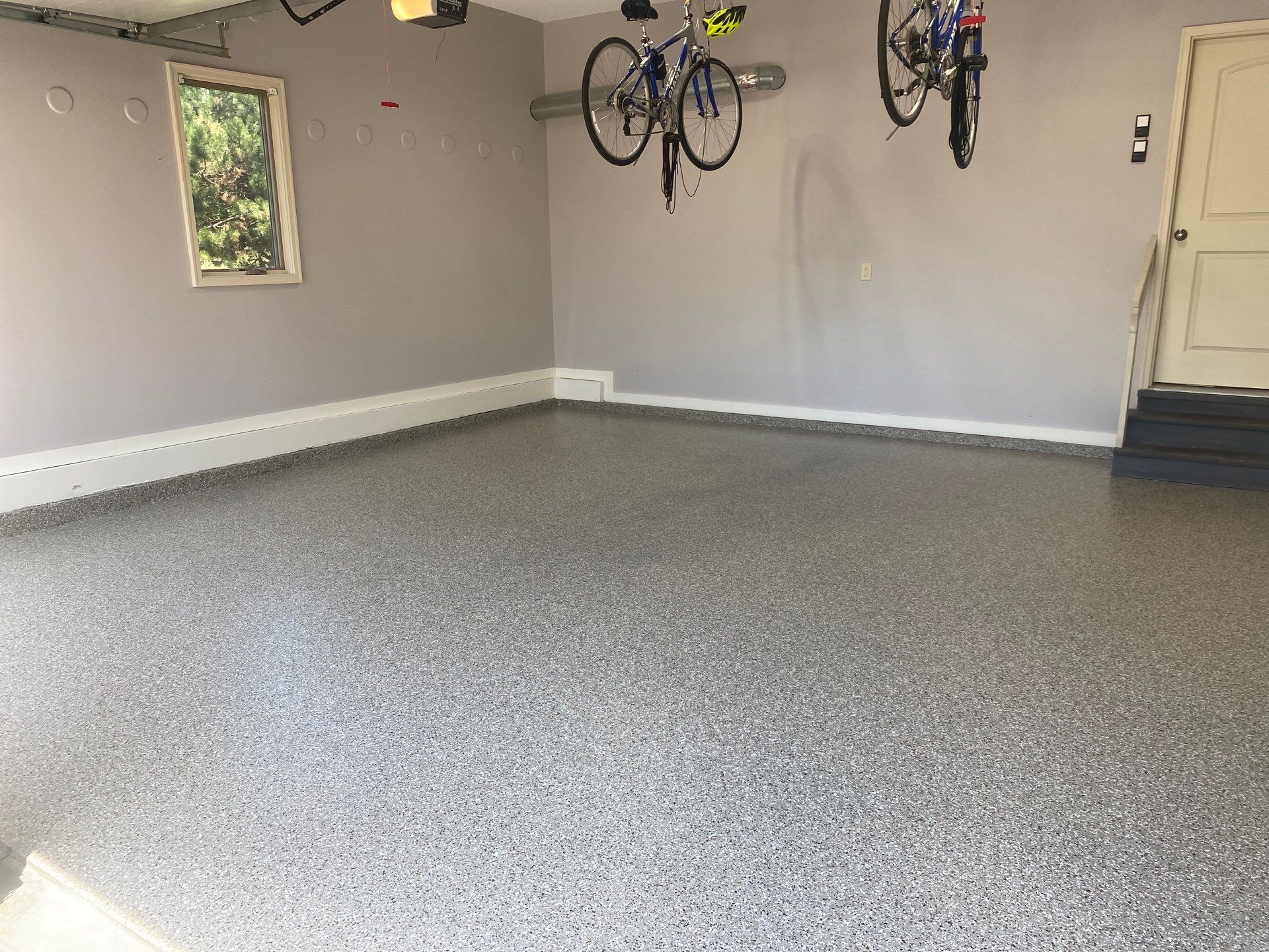 Dick E. gets a new garage floor! by Banner Garage