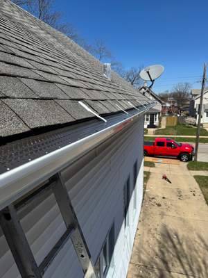 Turtle Shell gutter protection installation in Aurora, IL 60505, photograph 17