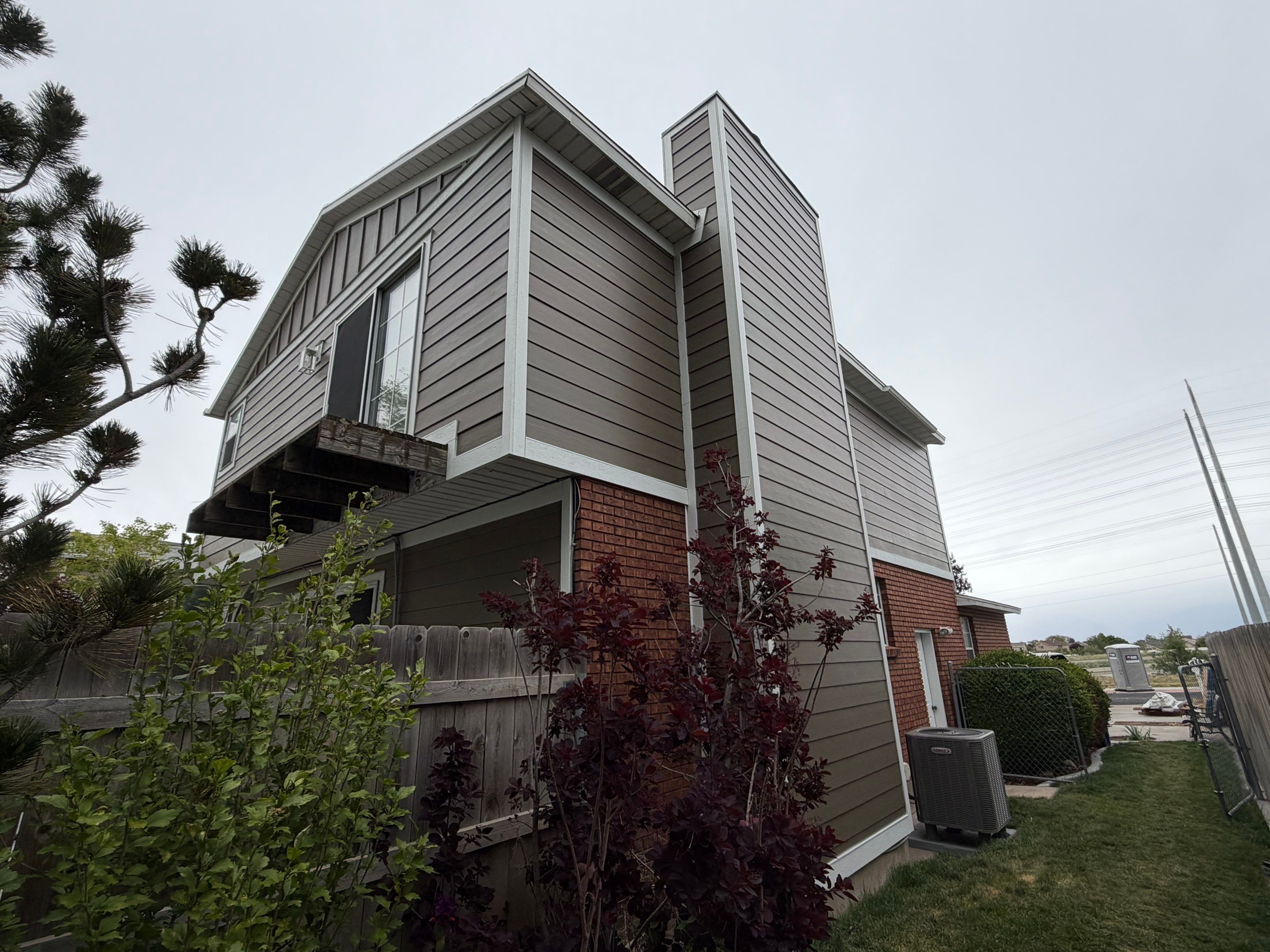 West Valley City | Aluminum to Hardie Conversion | Timber Bark & Arctic White by Ideal Siding Utah