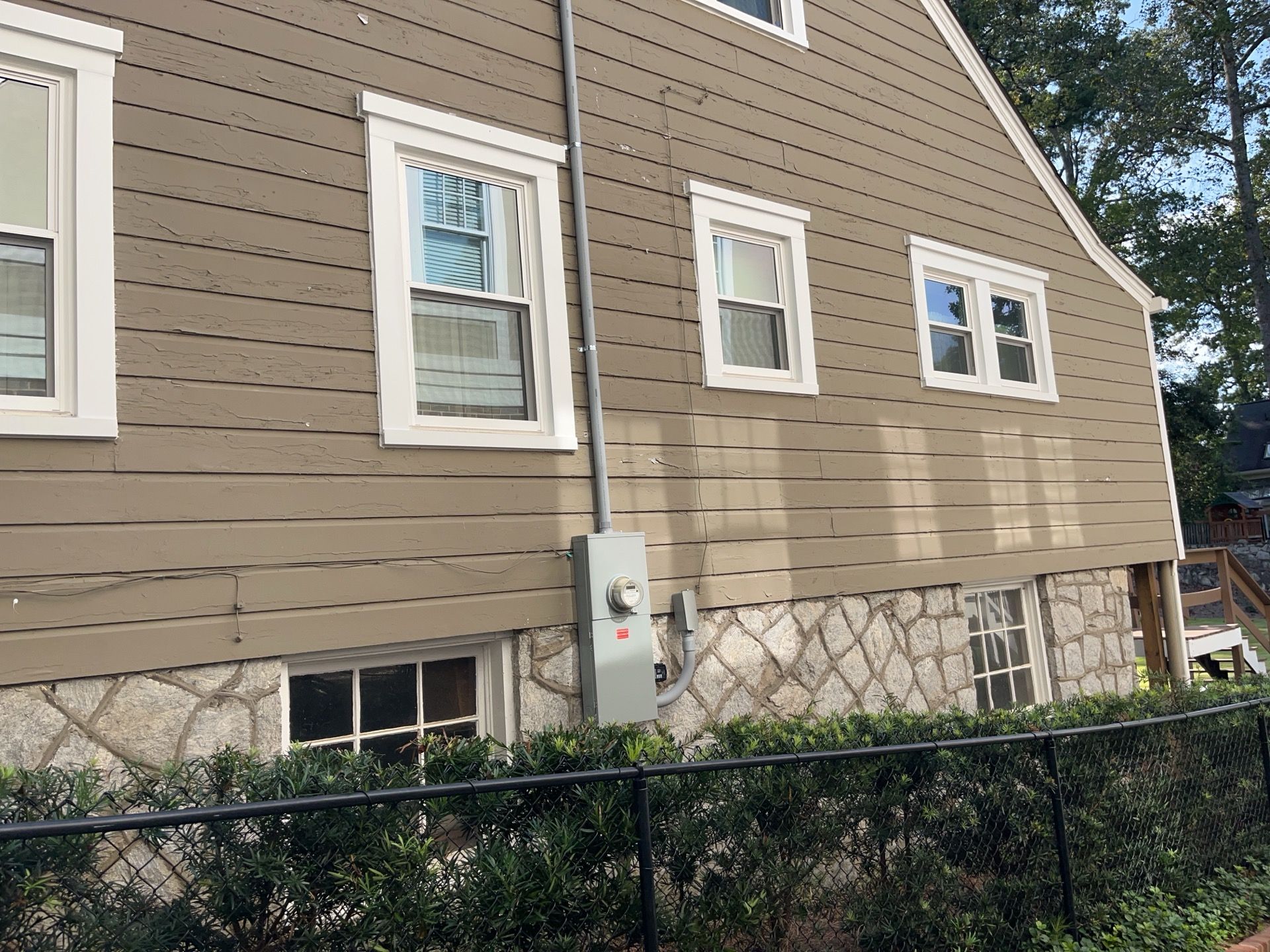 Full Siding Replacement, Deck Build, Exterior Paint, and Gutter Replacement by Nelson Exteriors