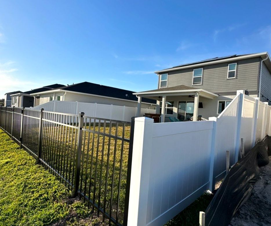Vinyl Fence Installation using Black 3 Rail Aluminum and Vinyl Privacy Fence  by Asap fence and gates, LLC