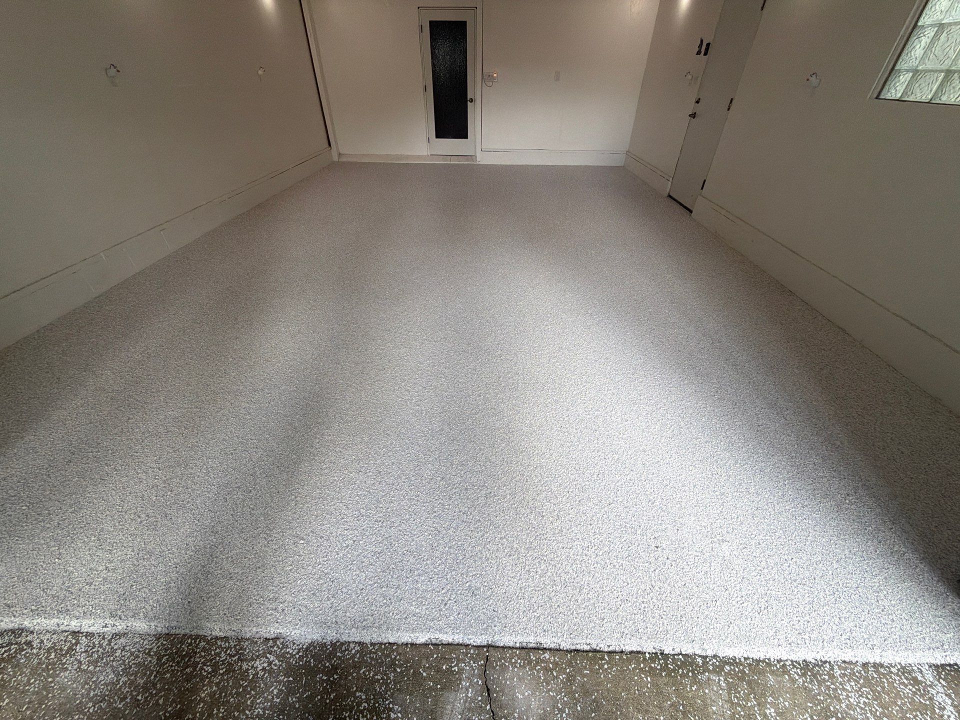 Custom Epoxy Flake Garage Floor Installation in Muskegon by Gordon Painting