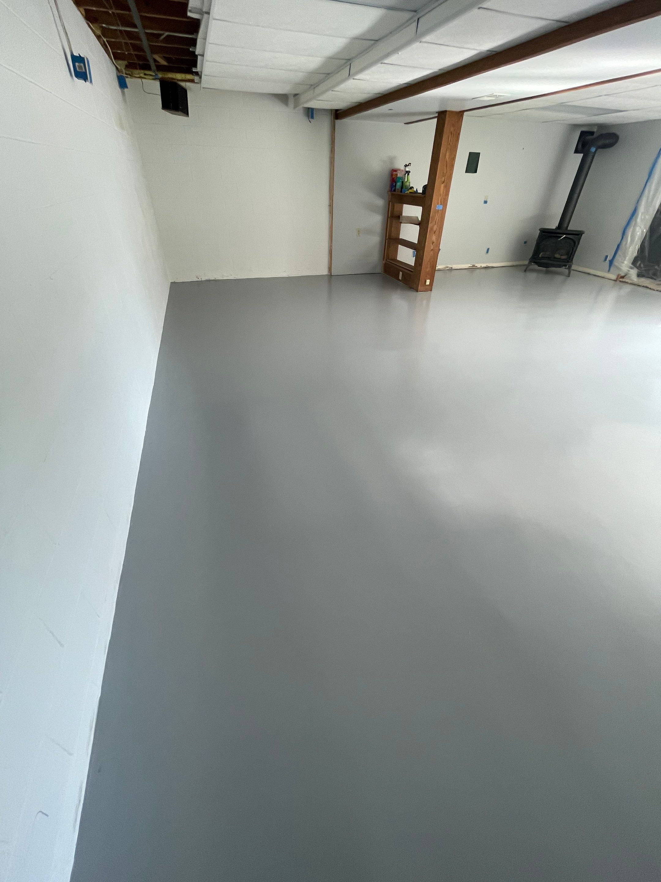 Solid Color Concrete Floor Coating for Renner Basement by Select Painting, Coatings & Garage Cabinets