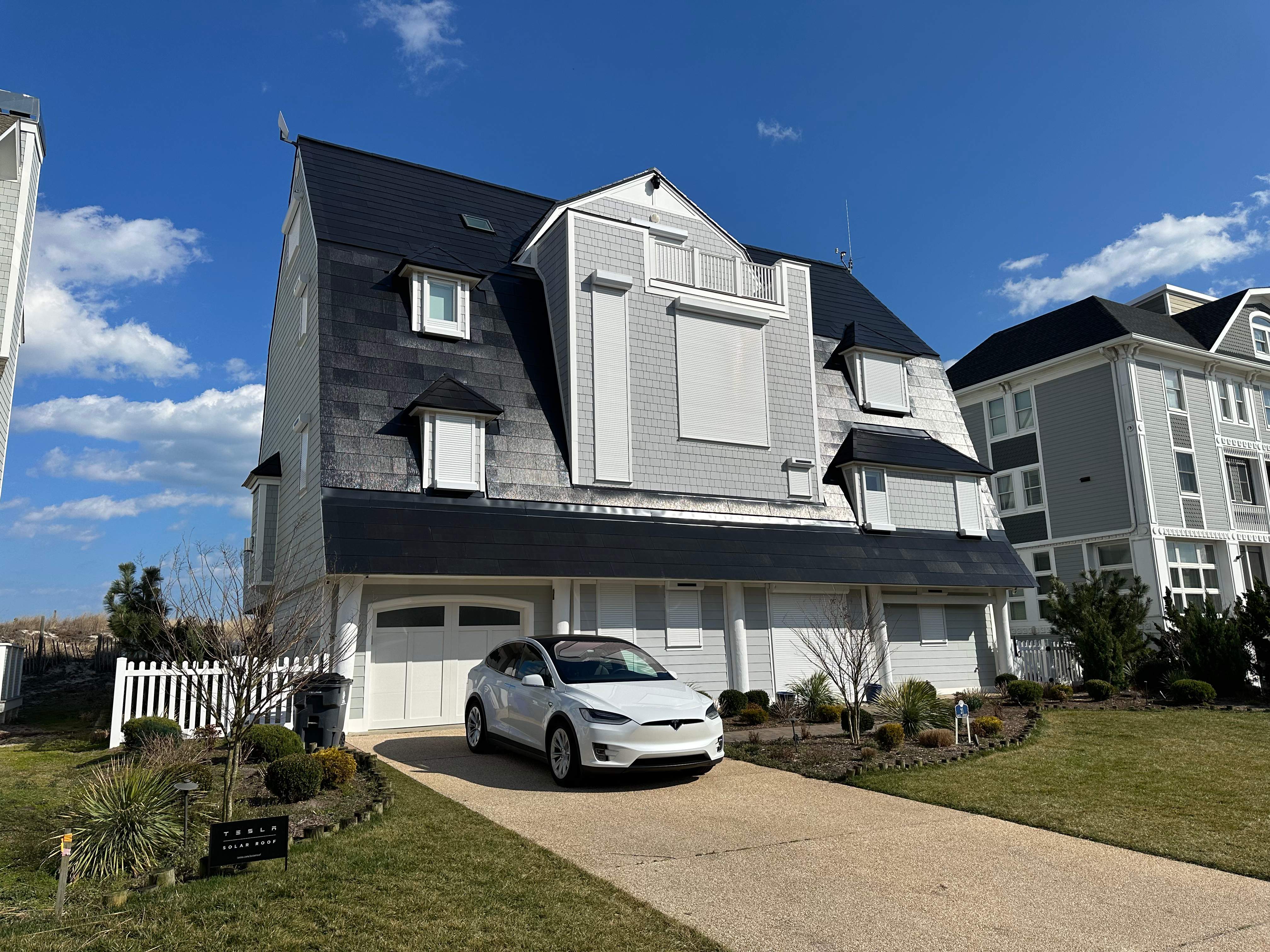 World's Steepest Tesla Solar Roof! by American Home Contractors