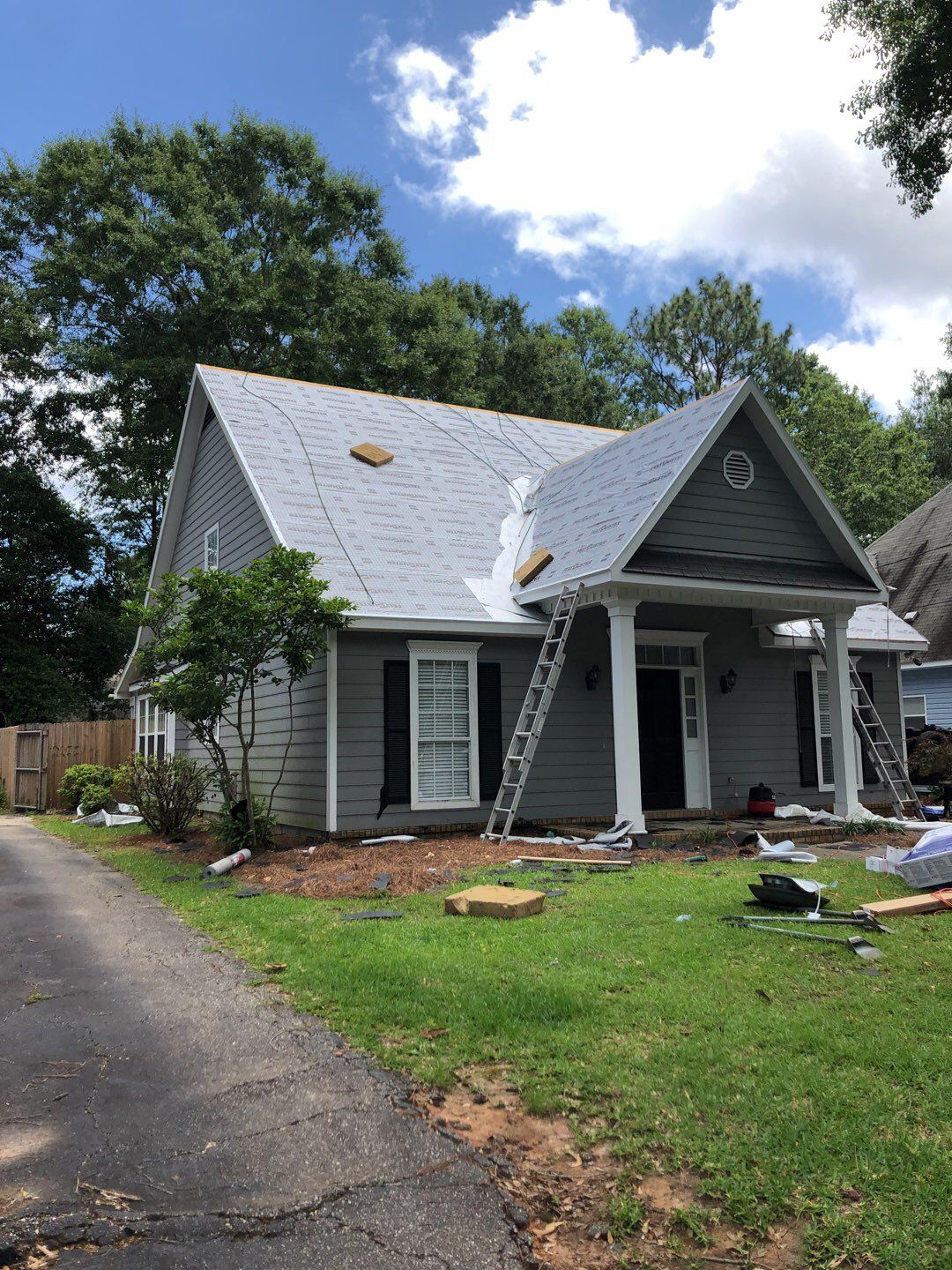 Residential Roofing Installation using Roof Replacement by American Roofing & Construction LLC