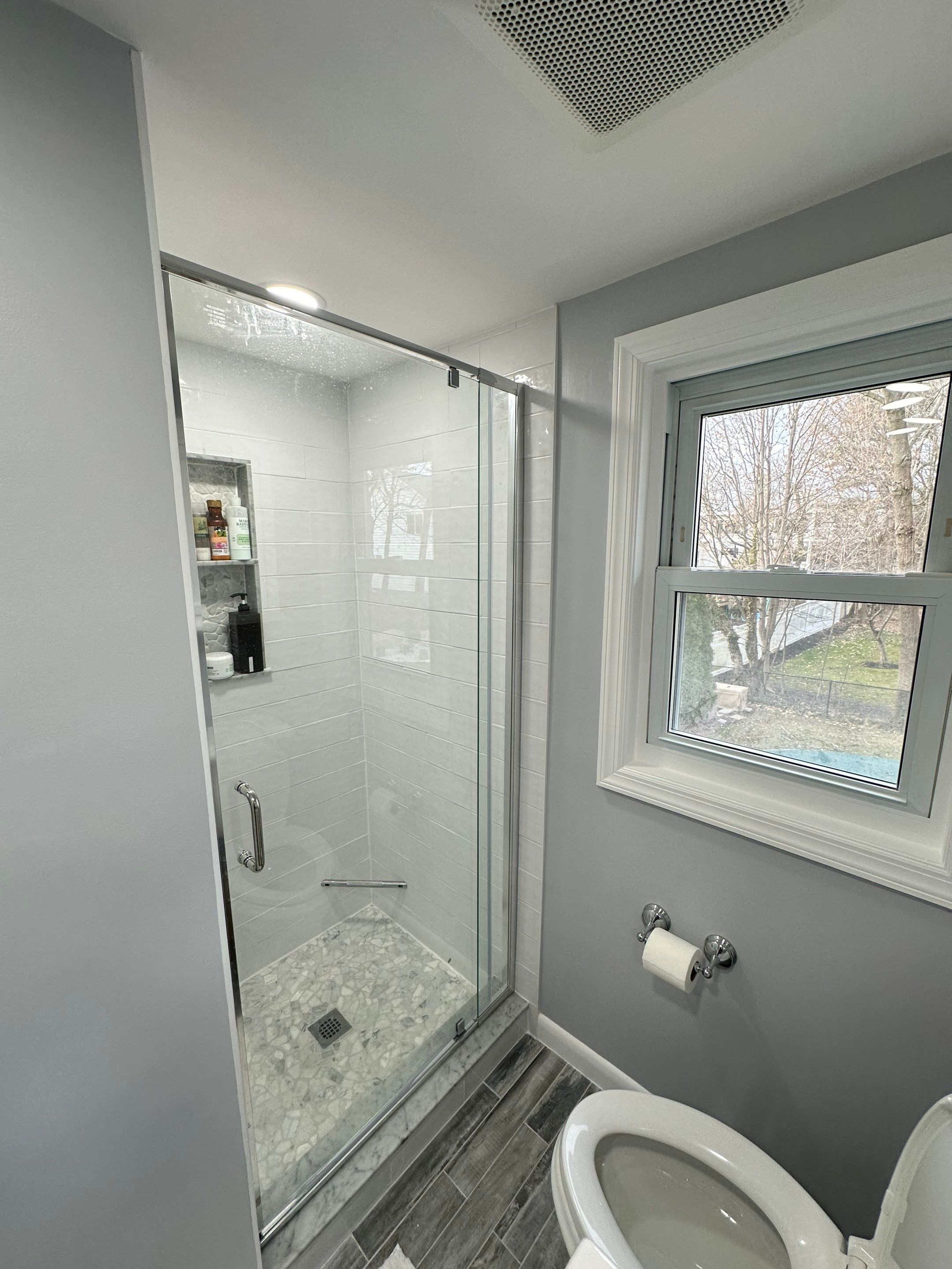 Bathroom Remodel using Tile by Home Concepts Construction