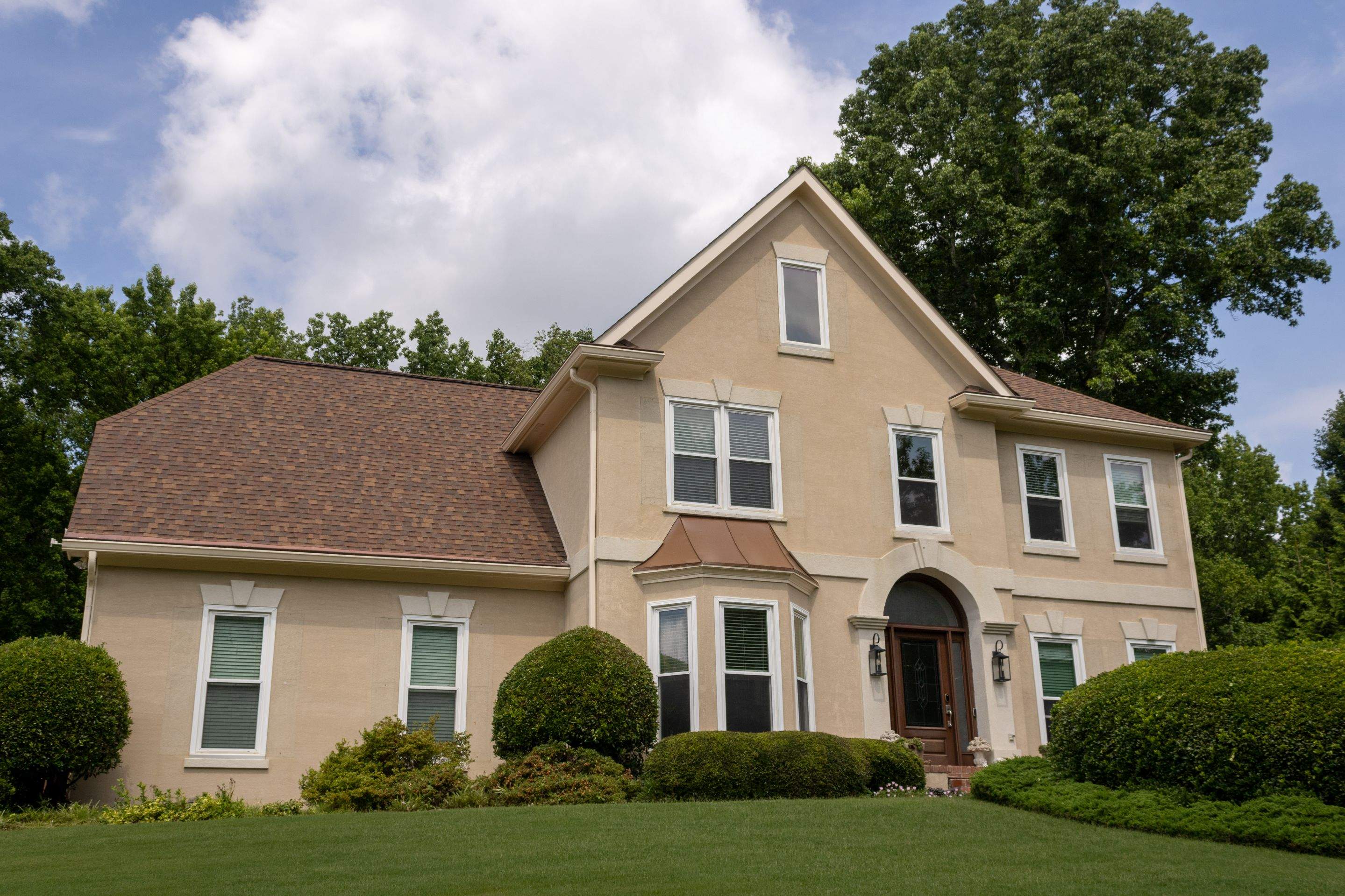 Exterior Painting using Sherwin-Williams and Rotted Wood Replacement by Nelson Exteriors 