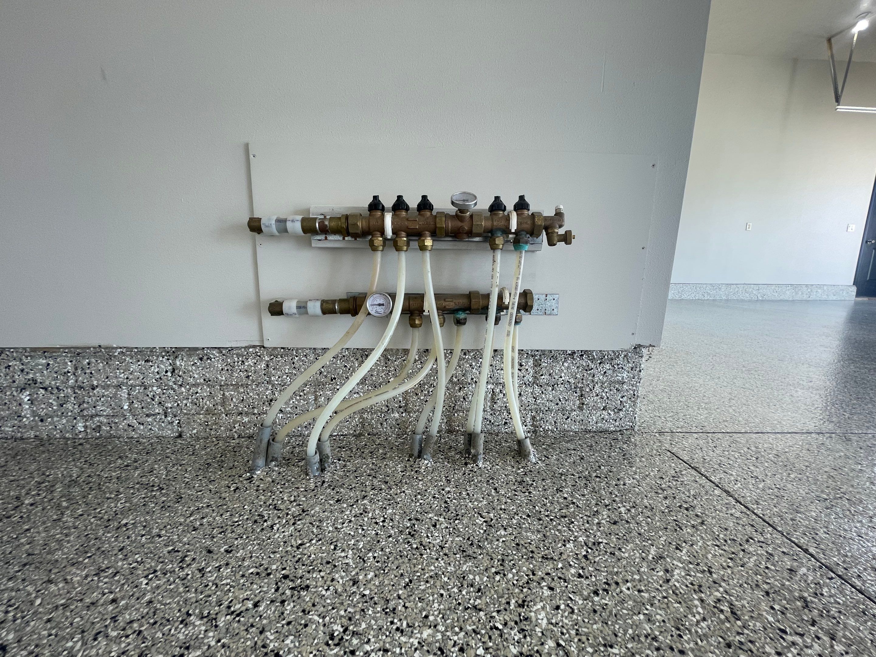 Multi-Car Garage Epoxy Floor Coating in Beresford by Select Painting, Coatings & Garage Cabinets