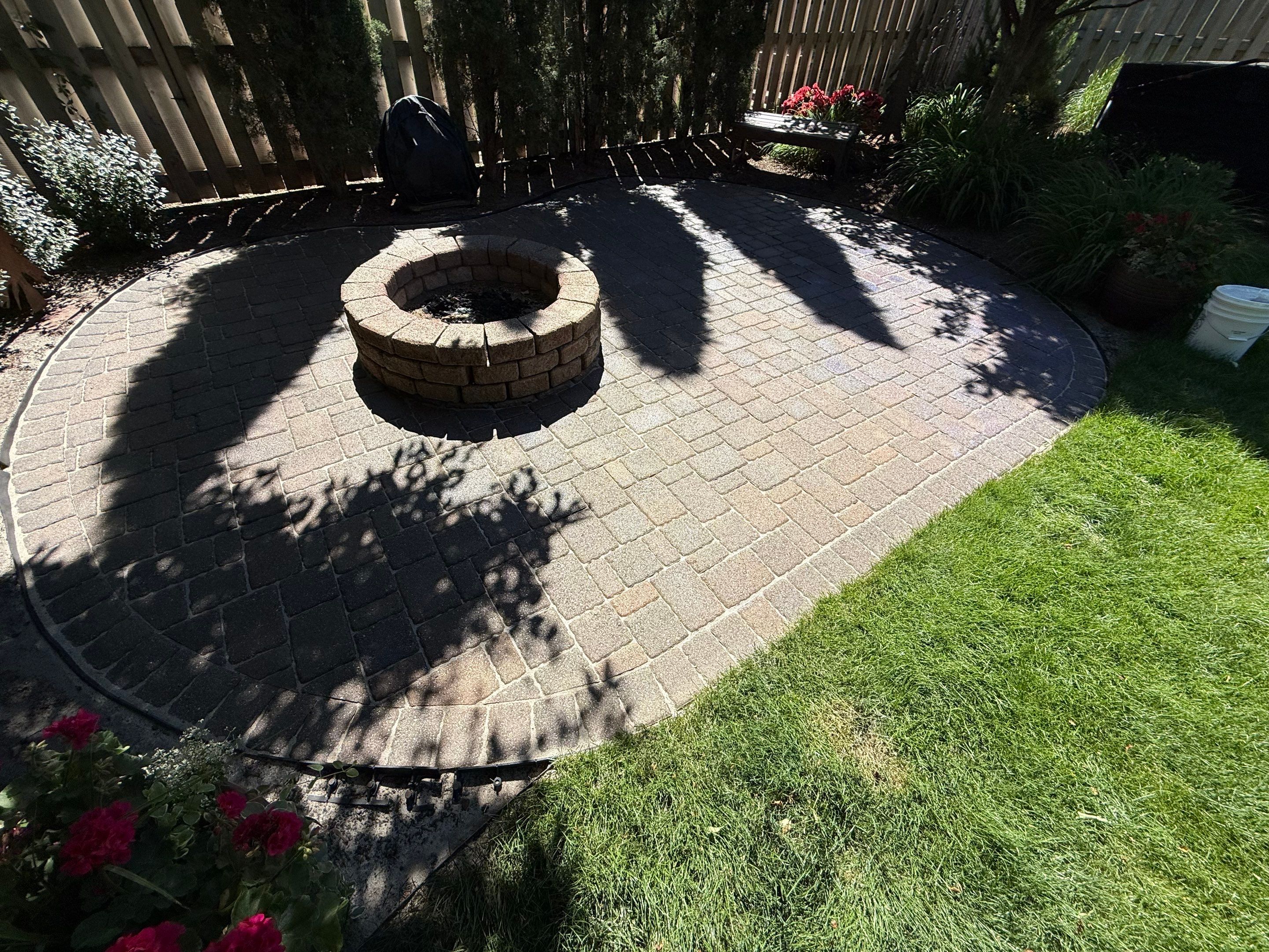 Textured Concrete Coating and Paver Patio Refresh in Sioux Falls by Select Painting, Coatings & Garage Cabinets