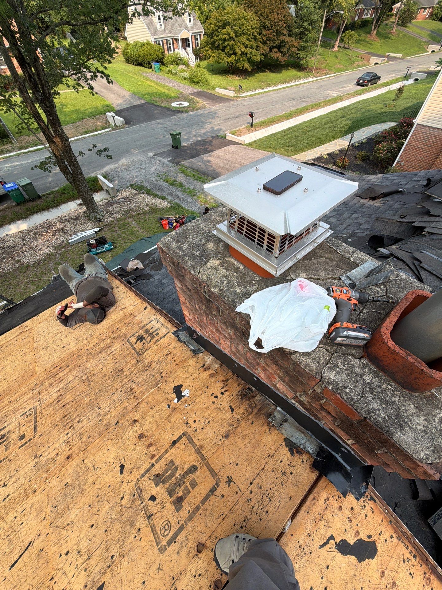 Asphalt Shingle Roof Replacement and Gutter Installation in Richmond by Cade Construction