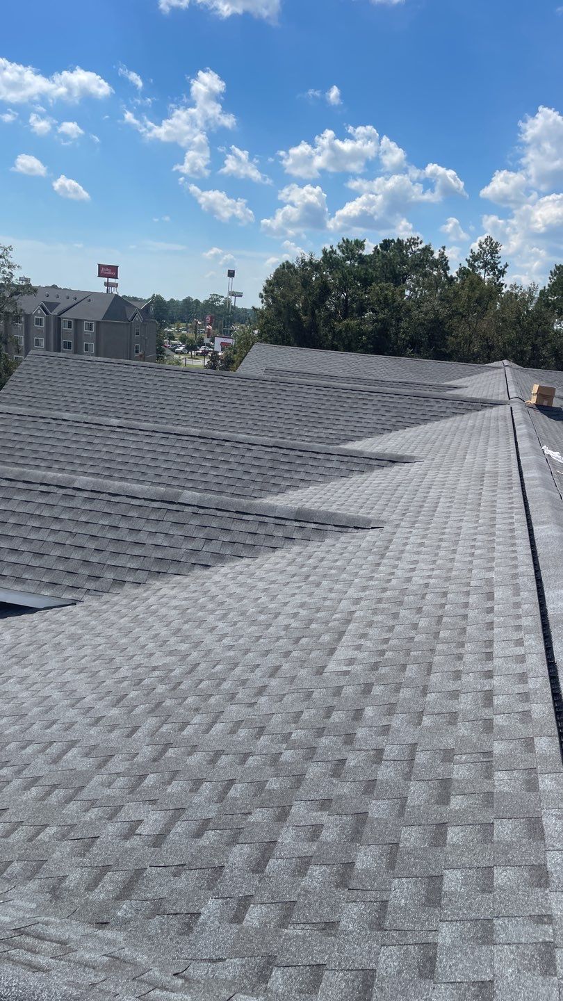 Commercial Roofing Installation using Roof Replacement by American Roofing & Construction LLC