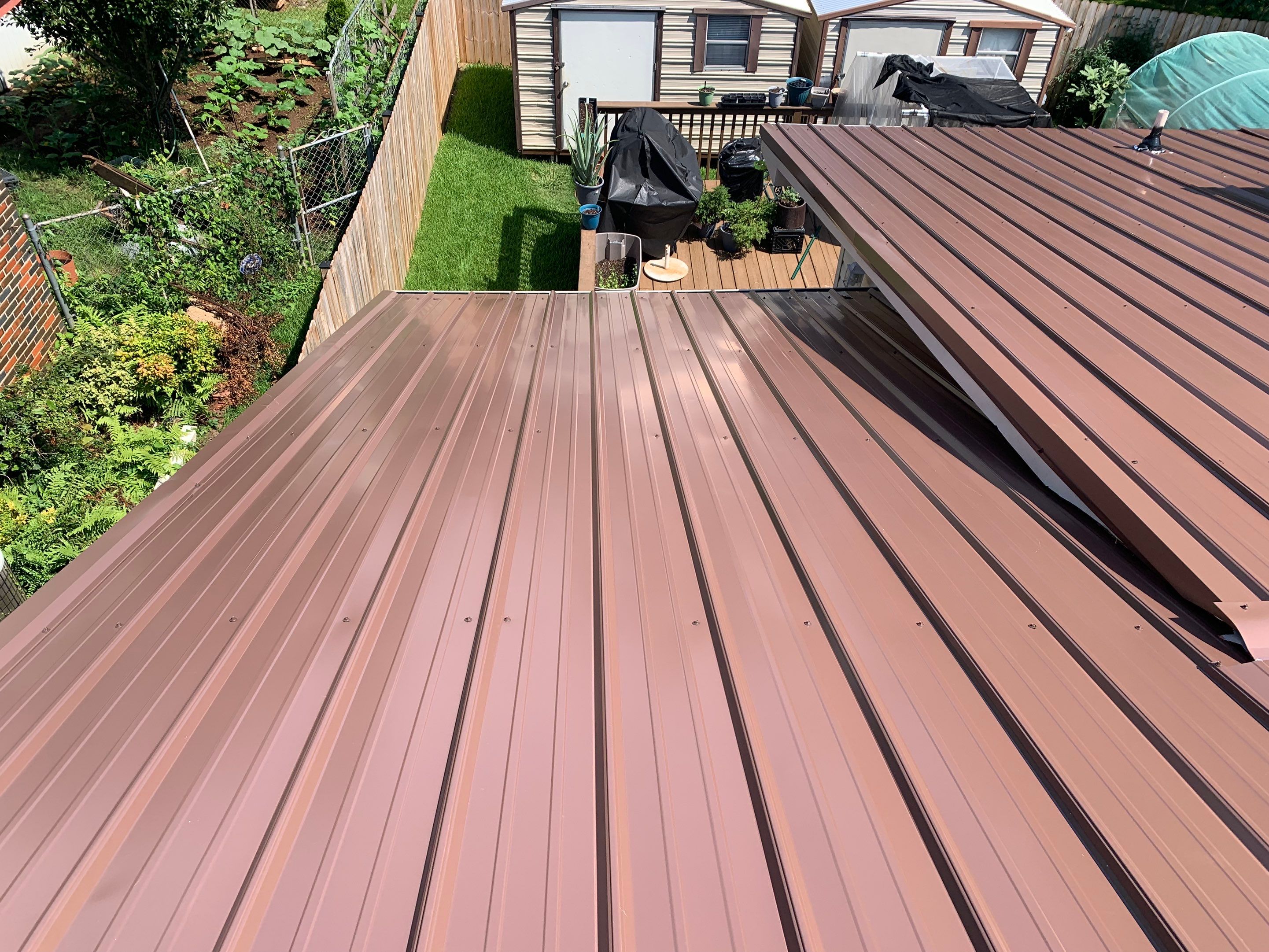 Residential Roofing Installation using 26 Gauge Metal by The Roofing Dudes