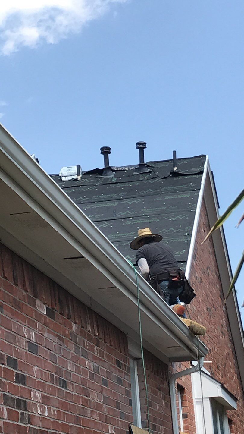 Roof and Gutter Replacement by Rainy Day Restoration