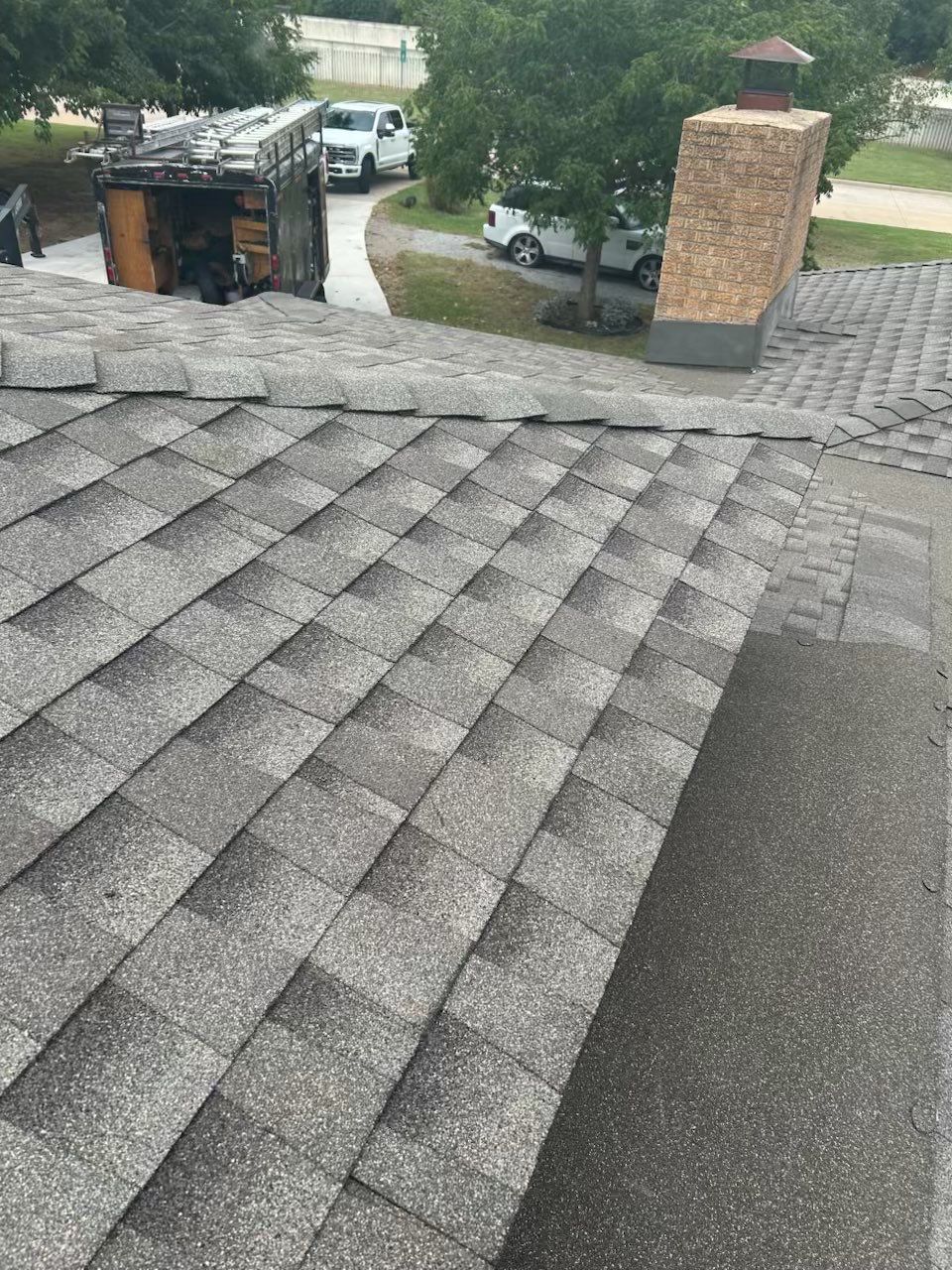 roof replacement, chimney flashing repair, and skylight replacement in Oklahoma City by McCann's Roofing and Construction