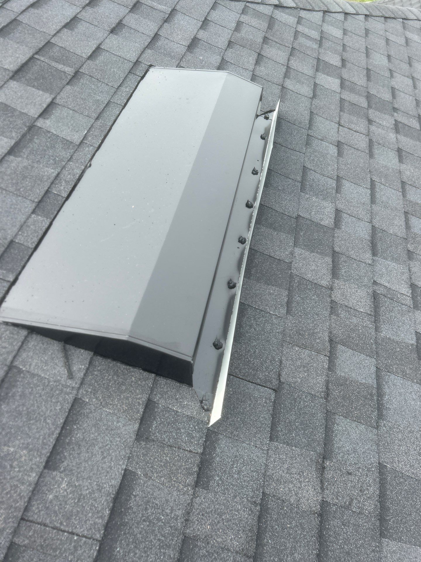 Architectural Shingle Roof Replacement and Skylight Installation in Port Orange by Tip Top Roofing Co., Inc.