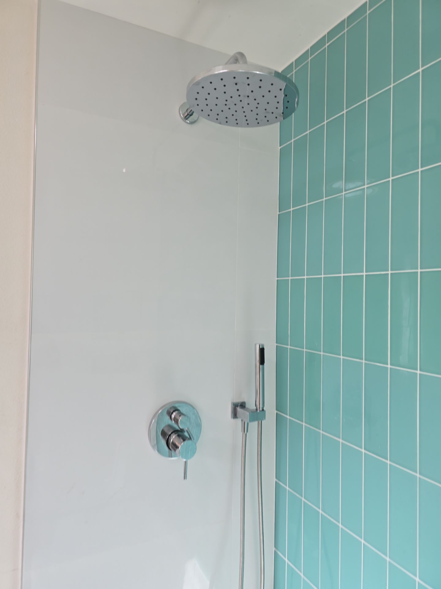 Scope of Work: Installation of Shower, Toilet, Sink, Fixtures, Pipes, and Seals by Us Plumbing