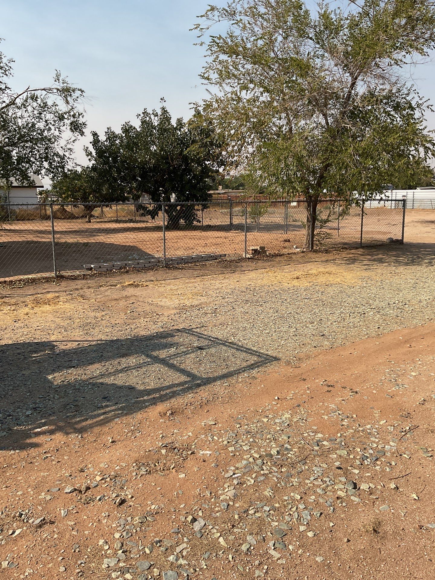 Gate installation using chain -link by Fence Guys Inc.