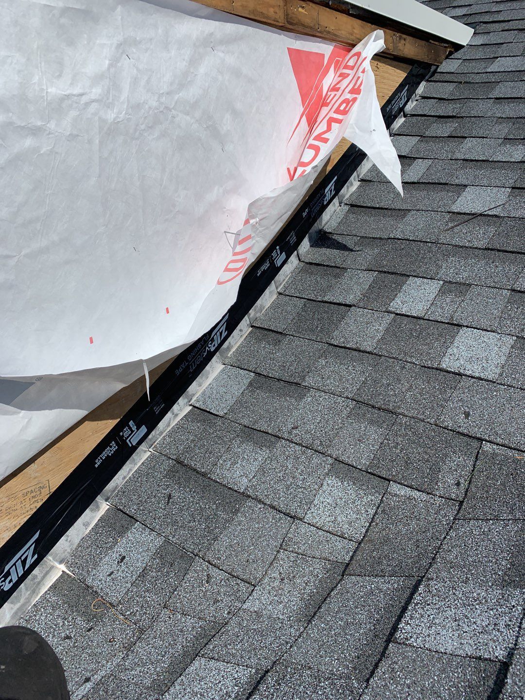 Commercial Roofing Installation using EPDM with white gutters by A Plus Exterior