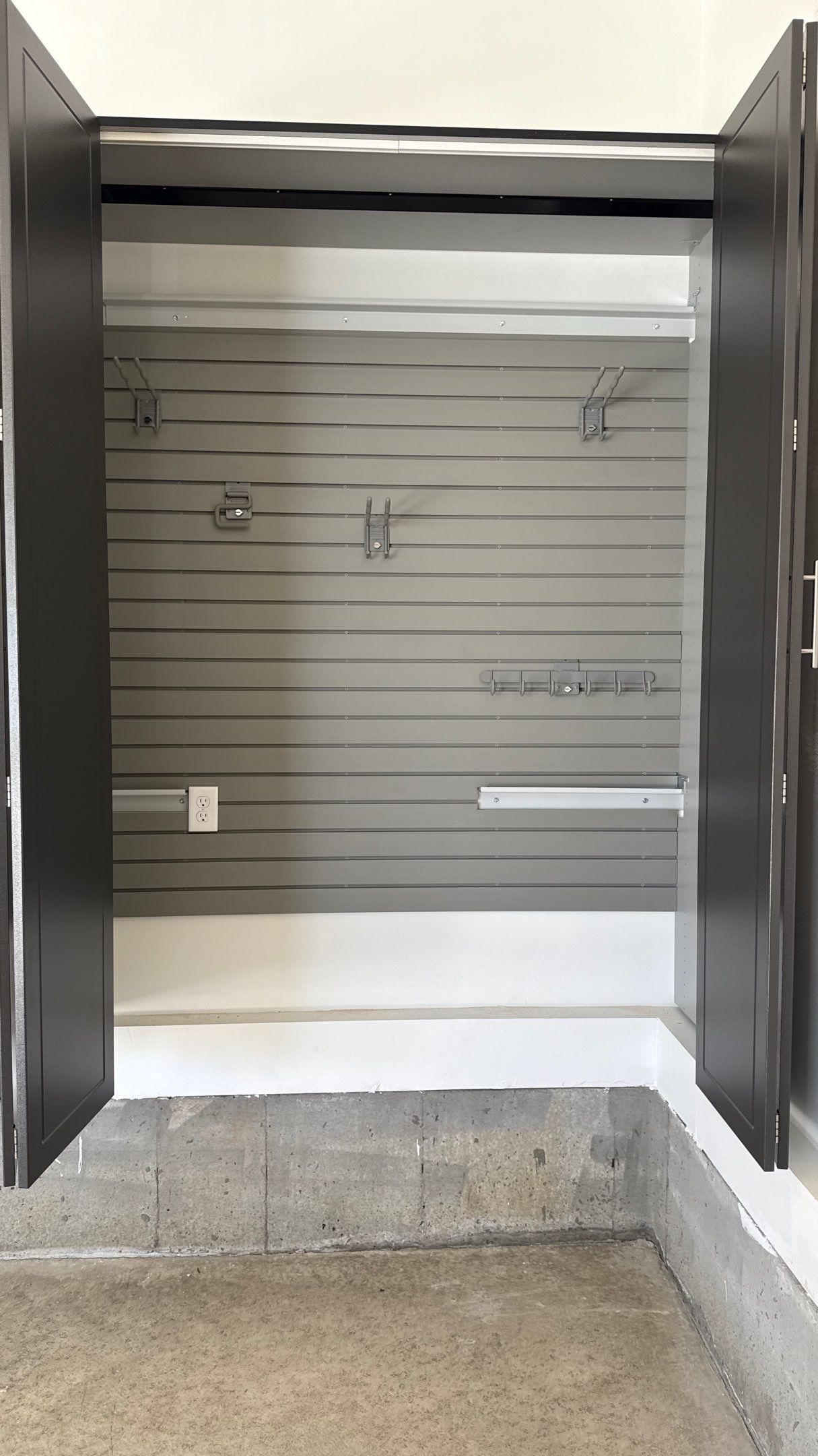 Nice Clean Look With These Pewter Cabinets by Banner Garage