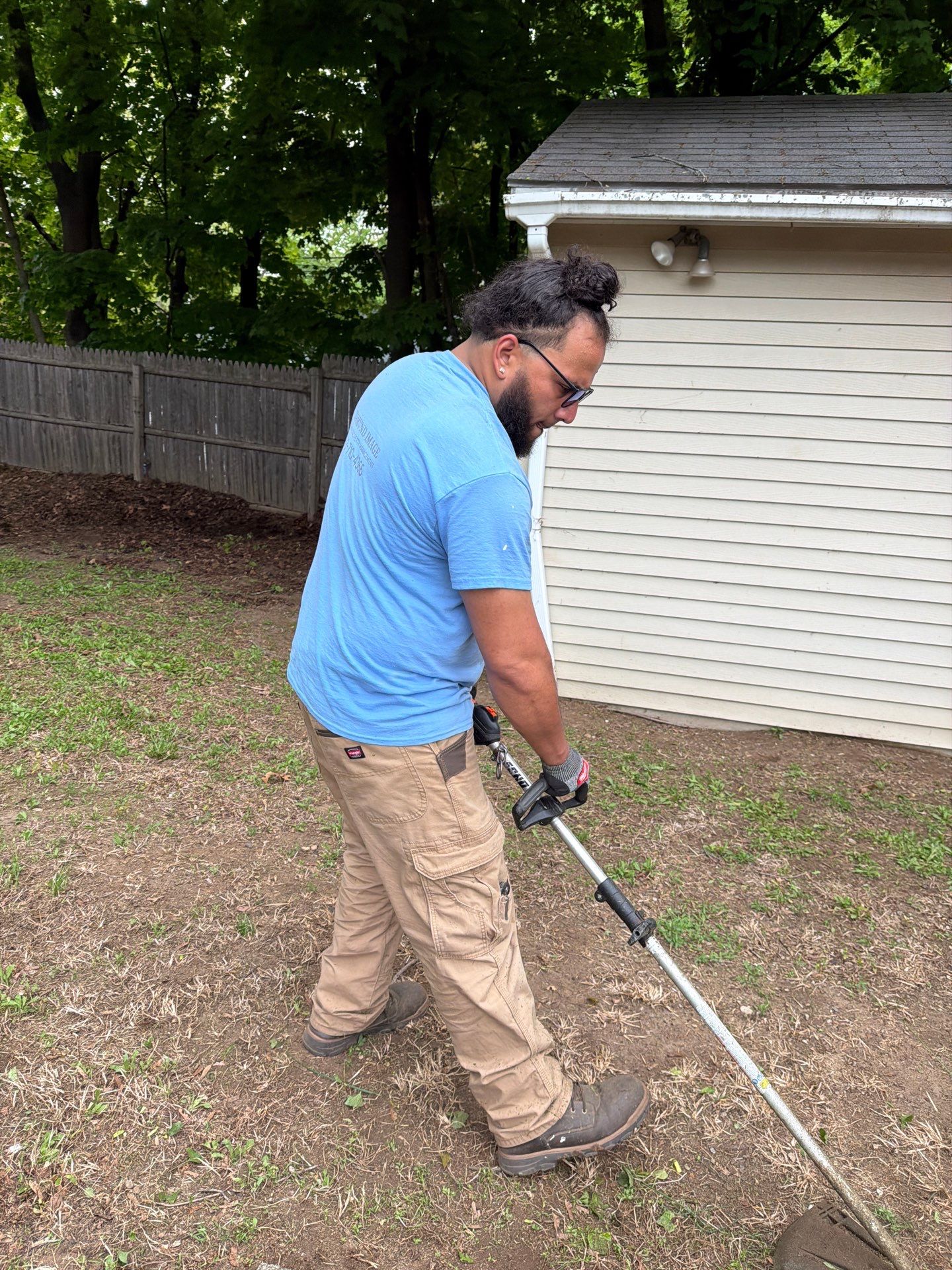 Residential Spring Cleanup and Fence Line Trimming in Seymour by Diamond Image LLC