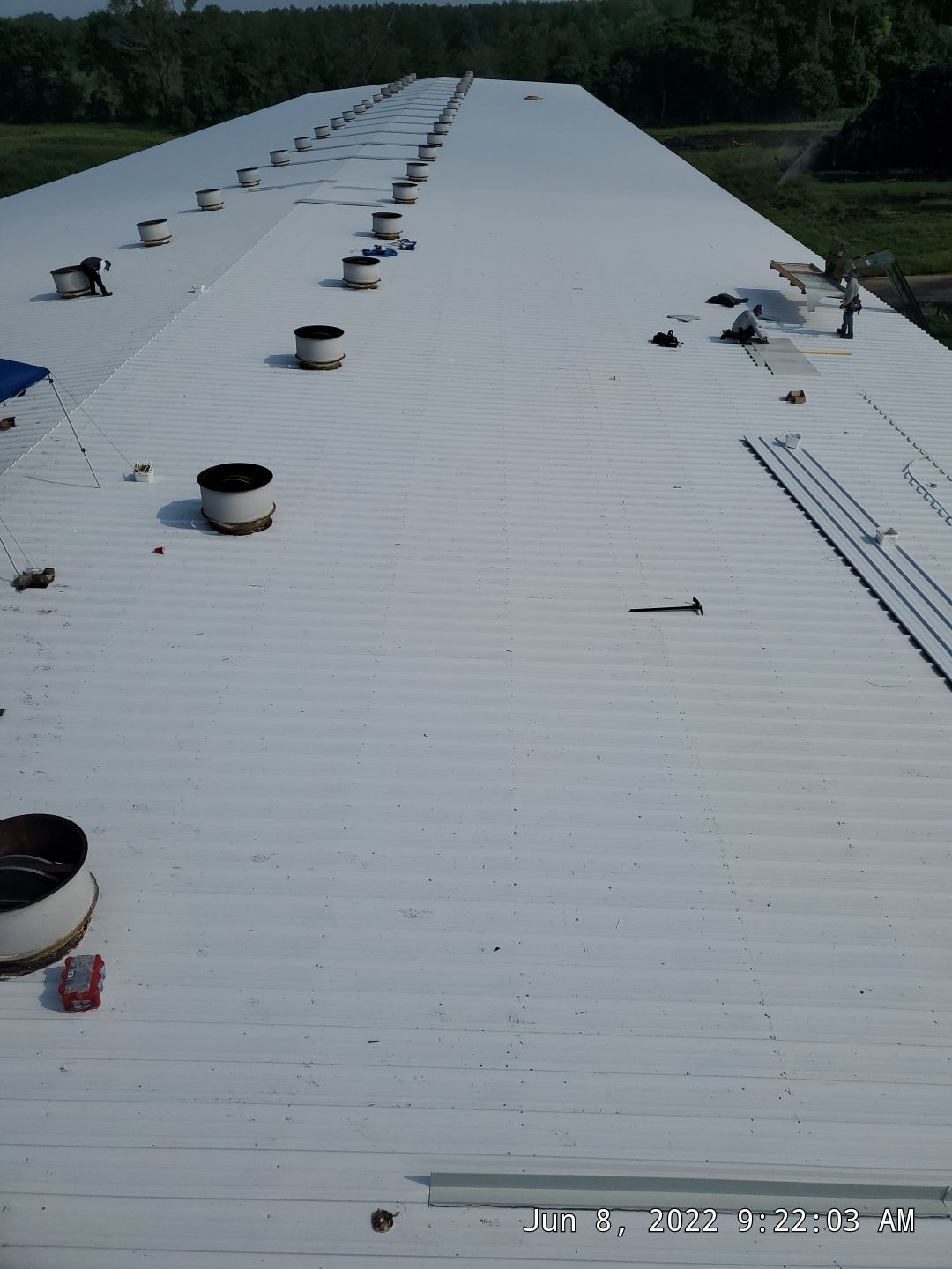 Commercial Roofing Installation using Aluminum Roofing panels by Hostetler Roofing
