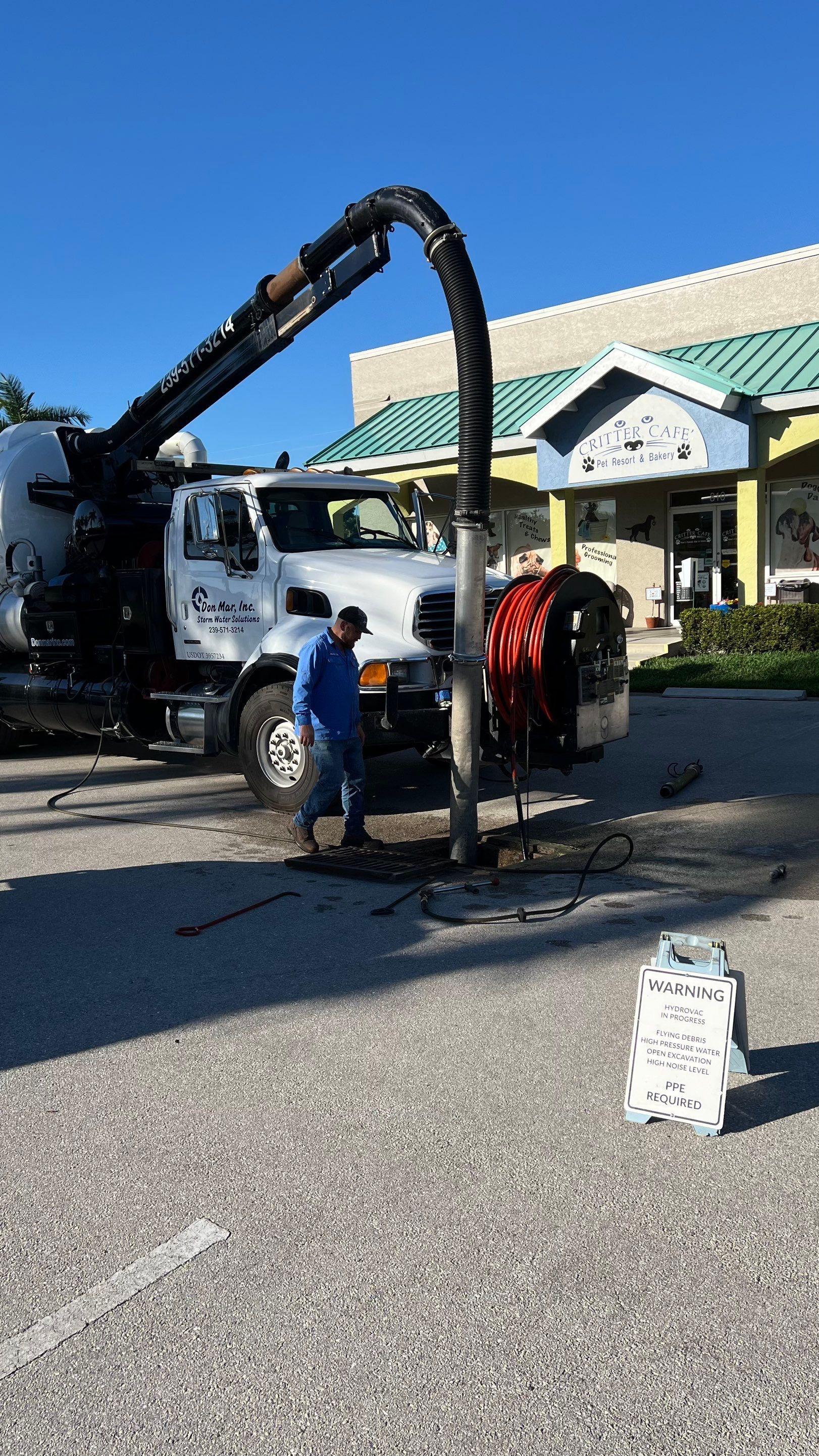 Stromwater System Maintenance at Bill Smith Appliances / Critter Cafe Marco Island Catch Basin by Don Mar, Inc. Storm Water Solutions