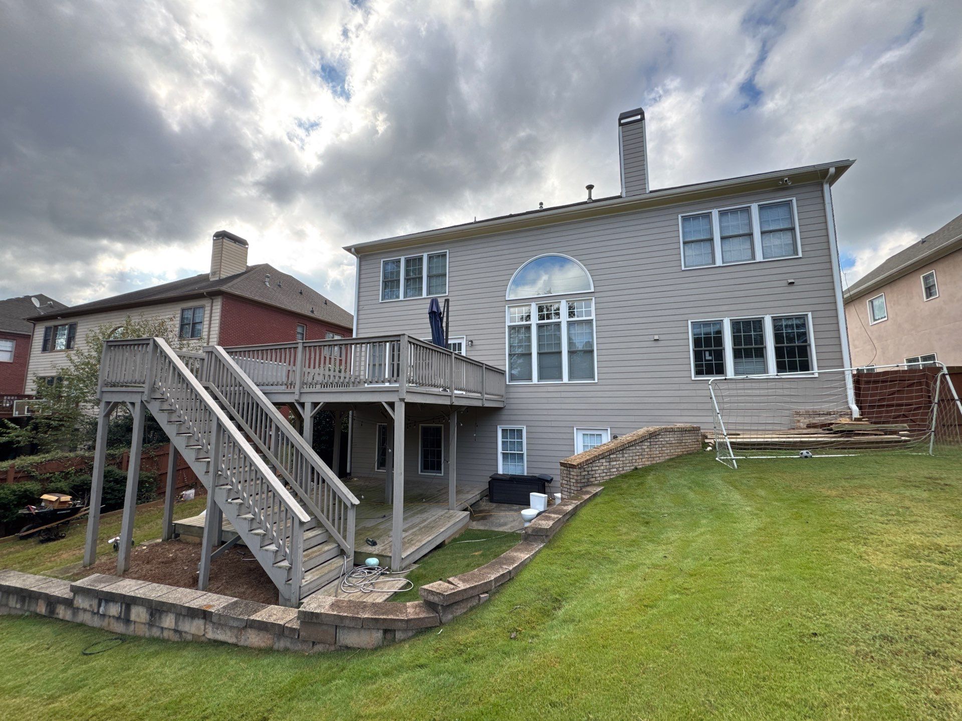 Custom Composite Deck and Covered Gabled Porch in Marietta by Swift Home Renovations