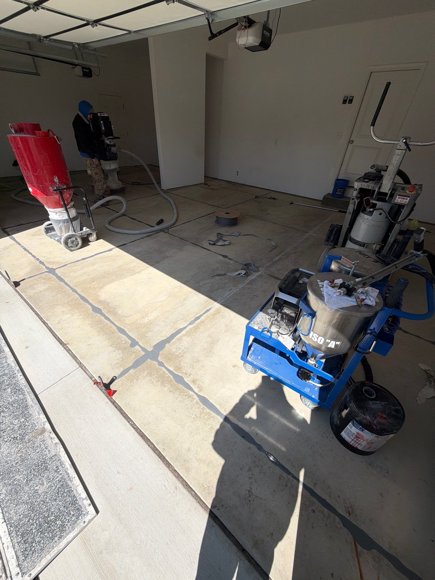 Multi-Car Garage Epoxy Flake Floor Installation in Byron Center by Gordon Painting