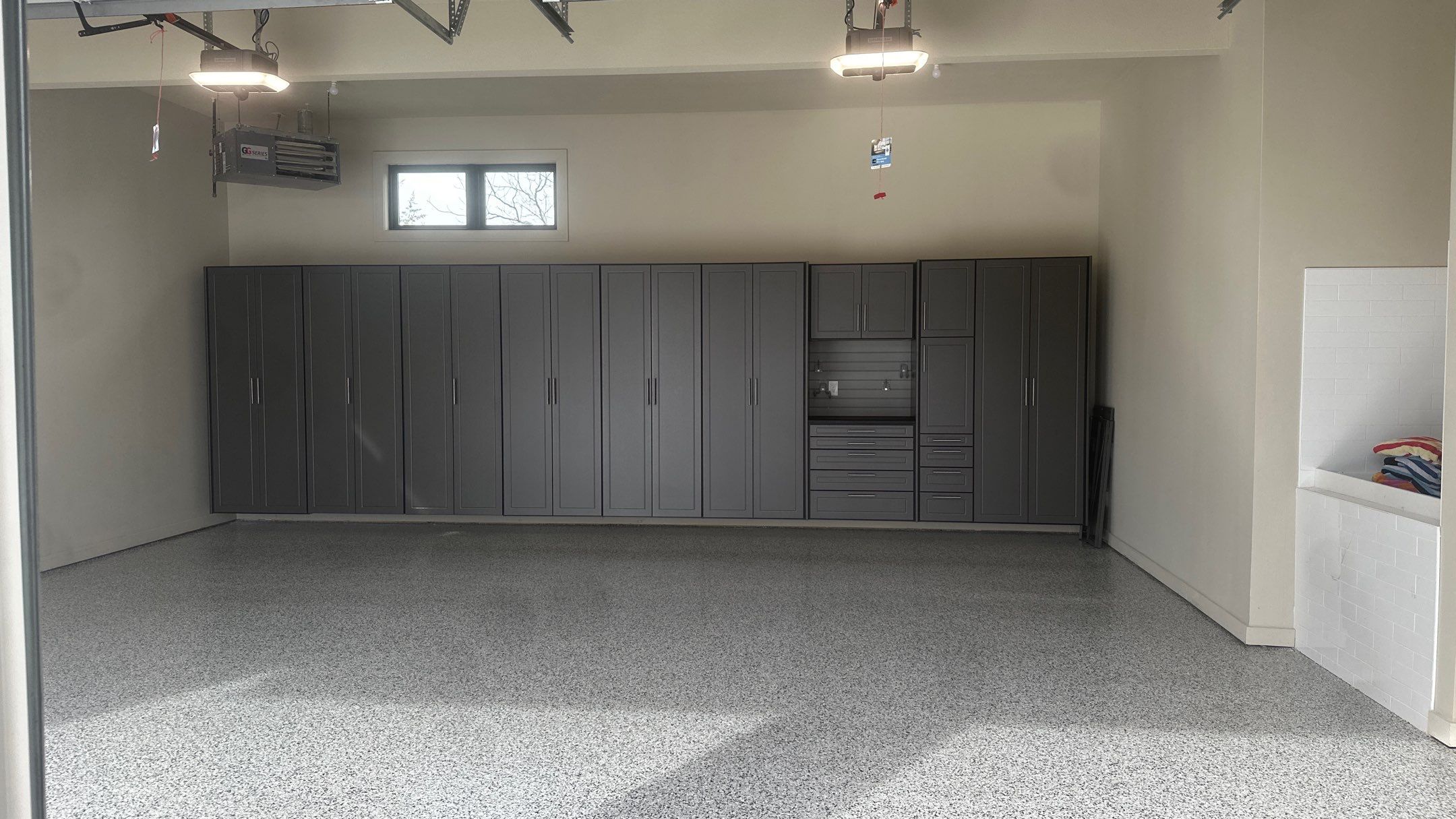Tim S. added Cabinets and a Banner Garage Floor to his garage by Banner Garage