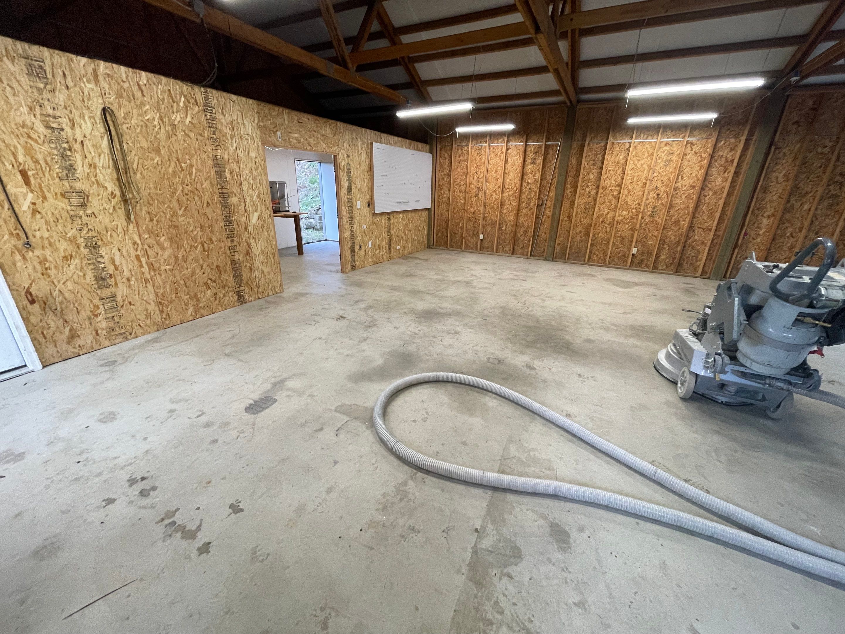 Garage Transformation using Penntek Evolution System and Smoke Color by Croc Coatings, LLC