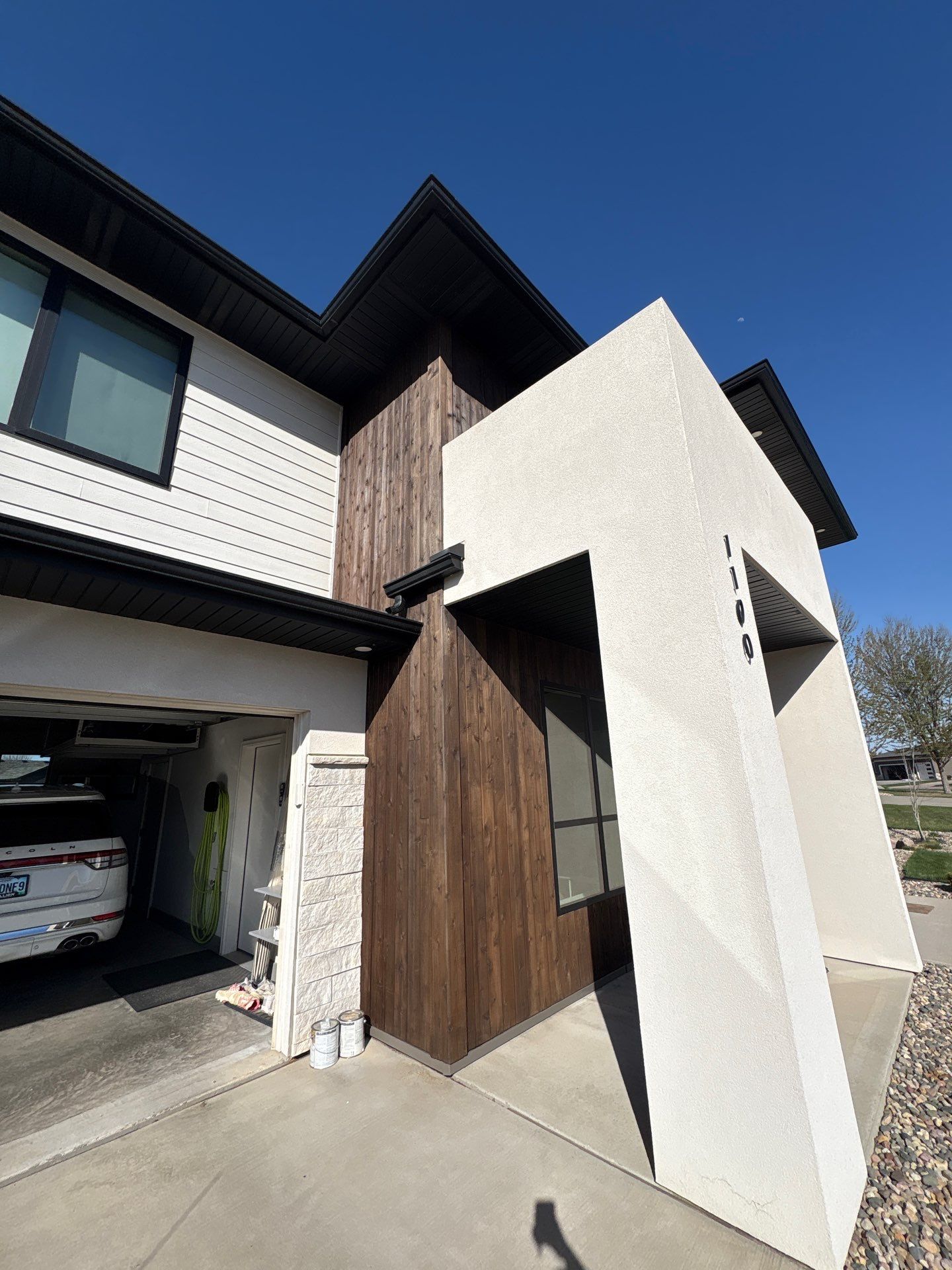 Modern Residential Exterior Painting and Door Refinishing in Sioux Falls by Select Painting, Coatings & Garage Cabinets